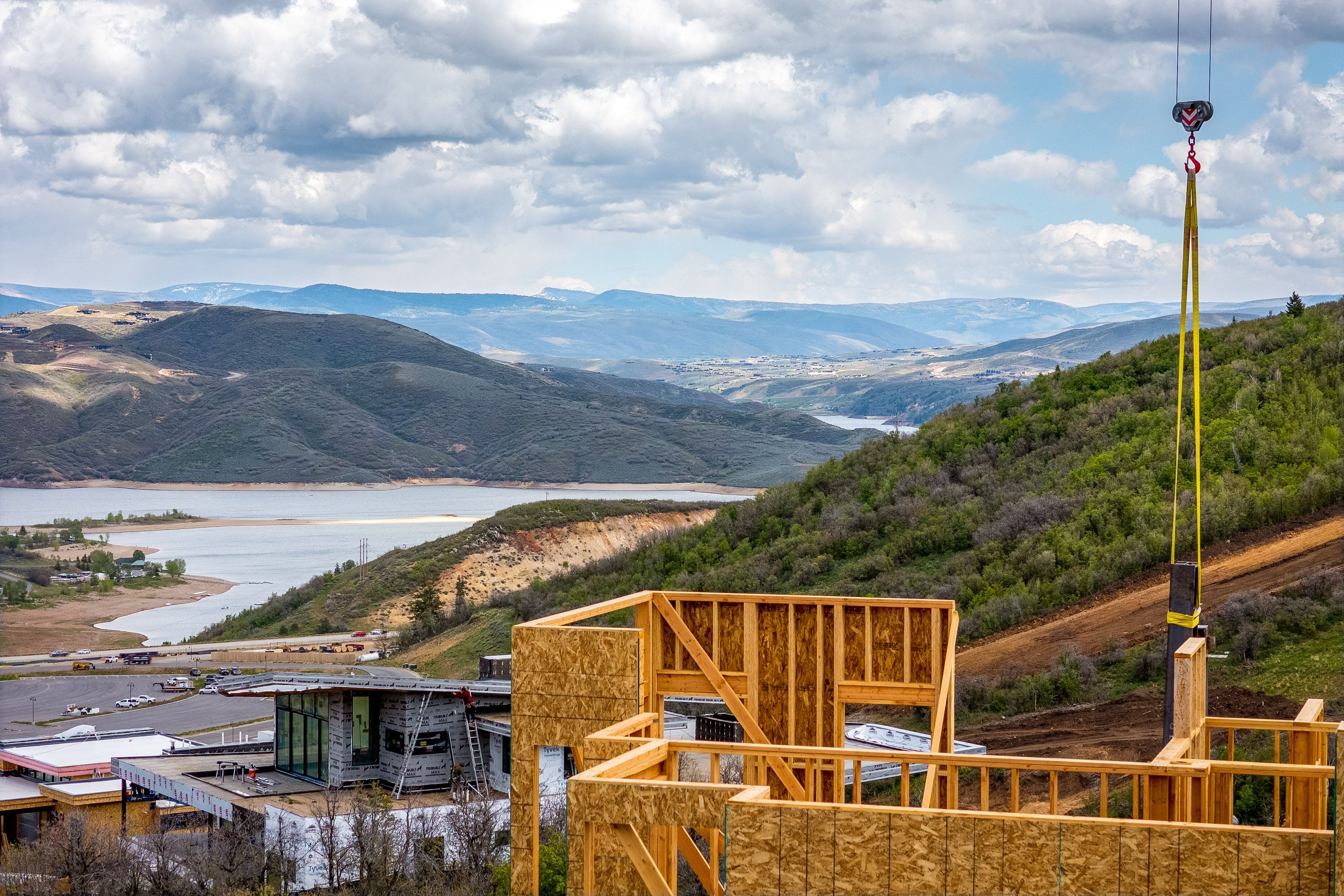 Framed structure under construction with exposed wood sheathing