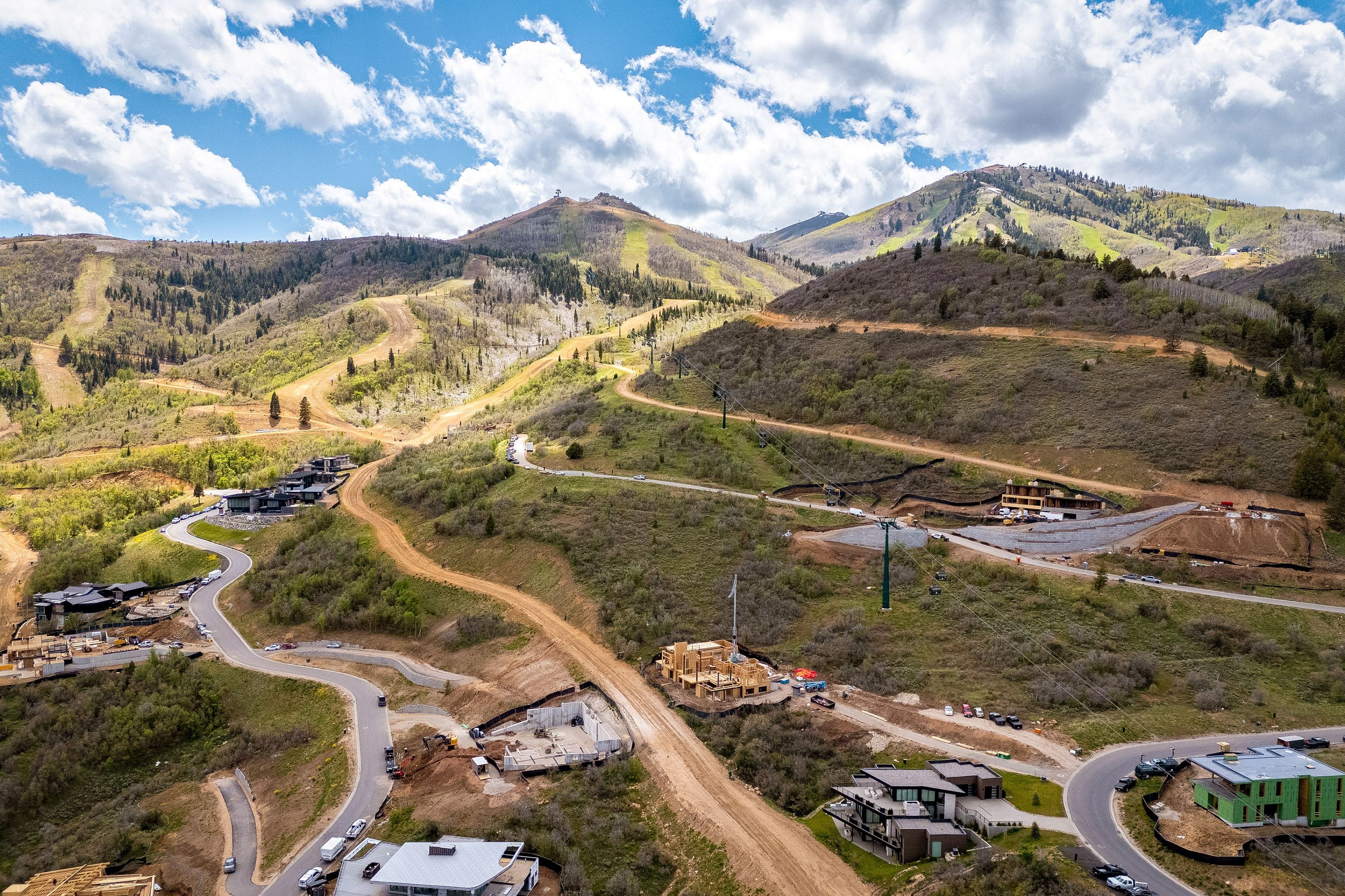 Mountainous terrain with ski slopes and natural vegetation