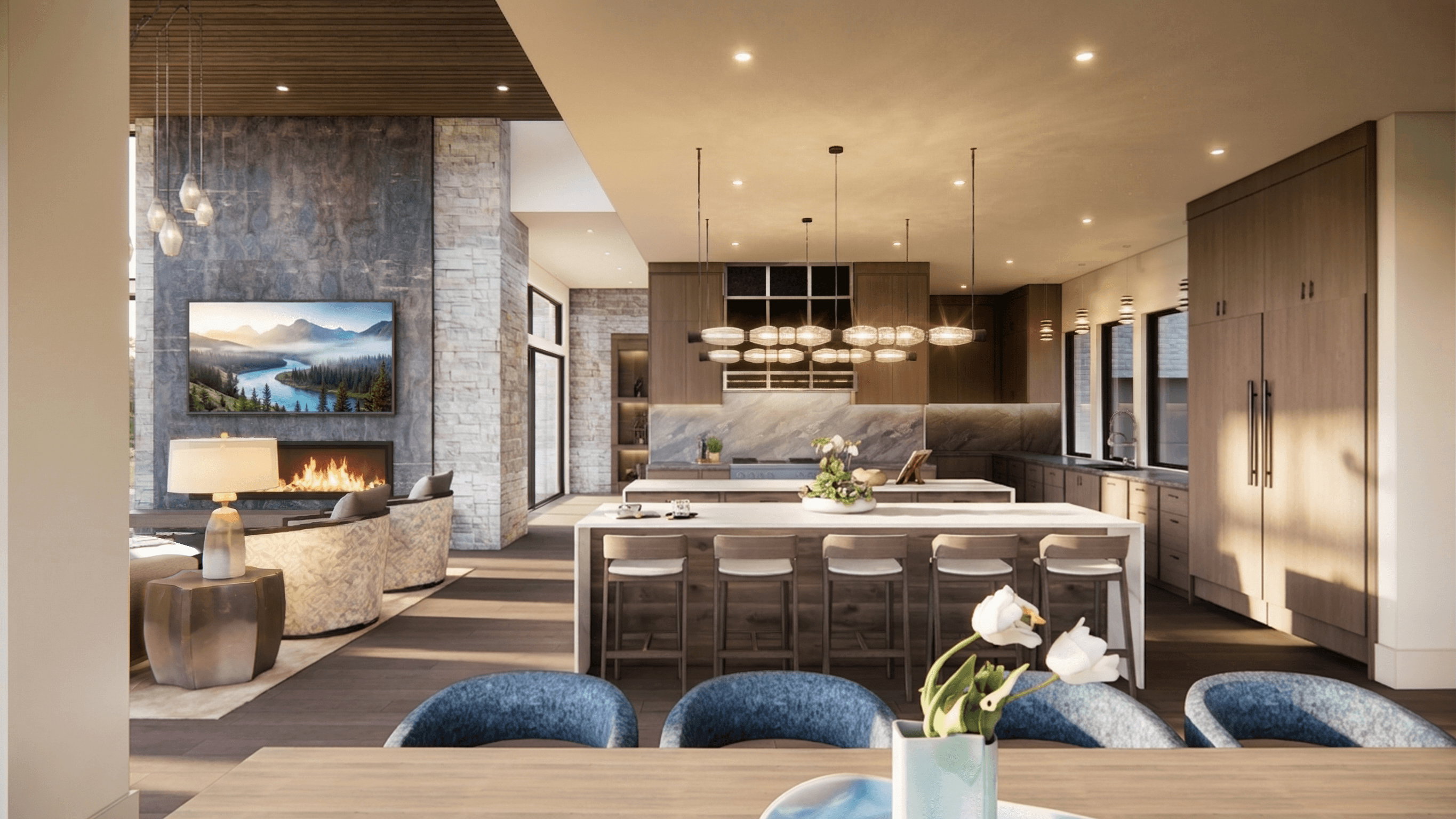 Gourmet kitchen and living area featuring a stone accent wall, linear fireplace, wood-finish flooring, two kitchen islands with seating, and integrated appliances