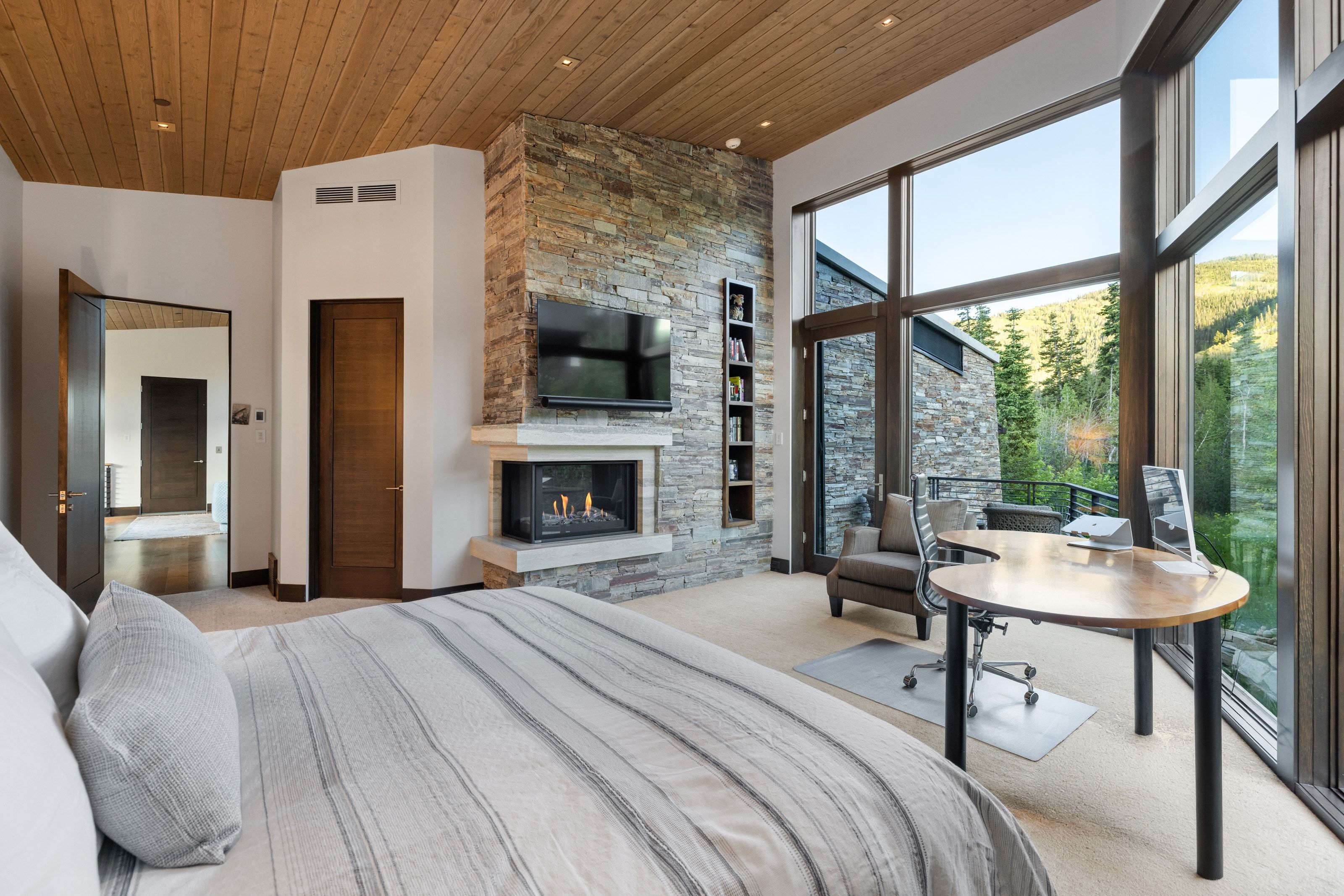 Wood-paneled ceiling with recessed lighting