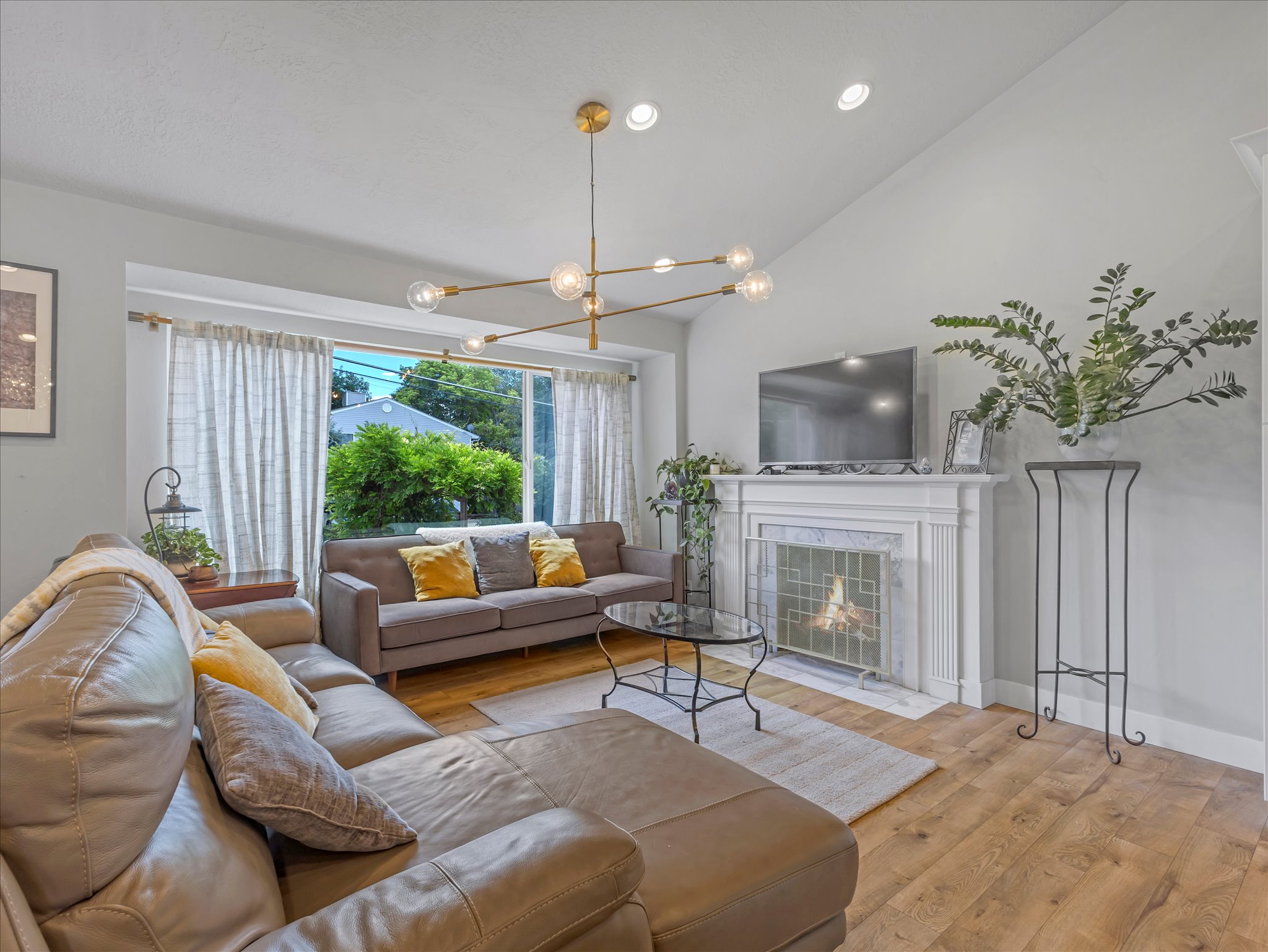 Great Room with Vaulted Ceilings and a cozy fireplace
