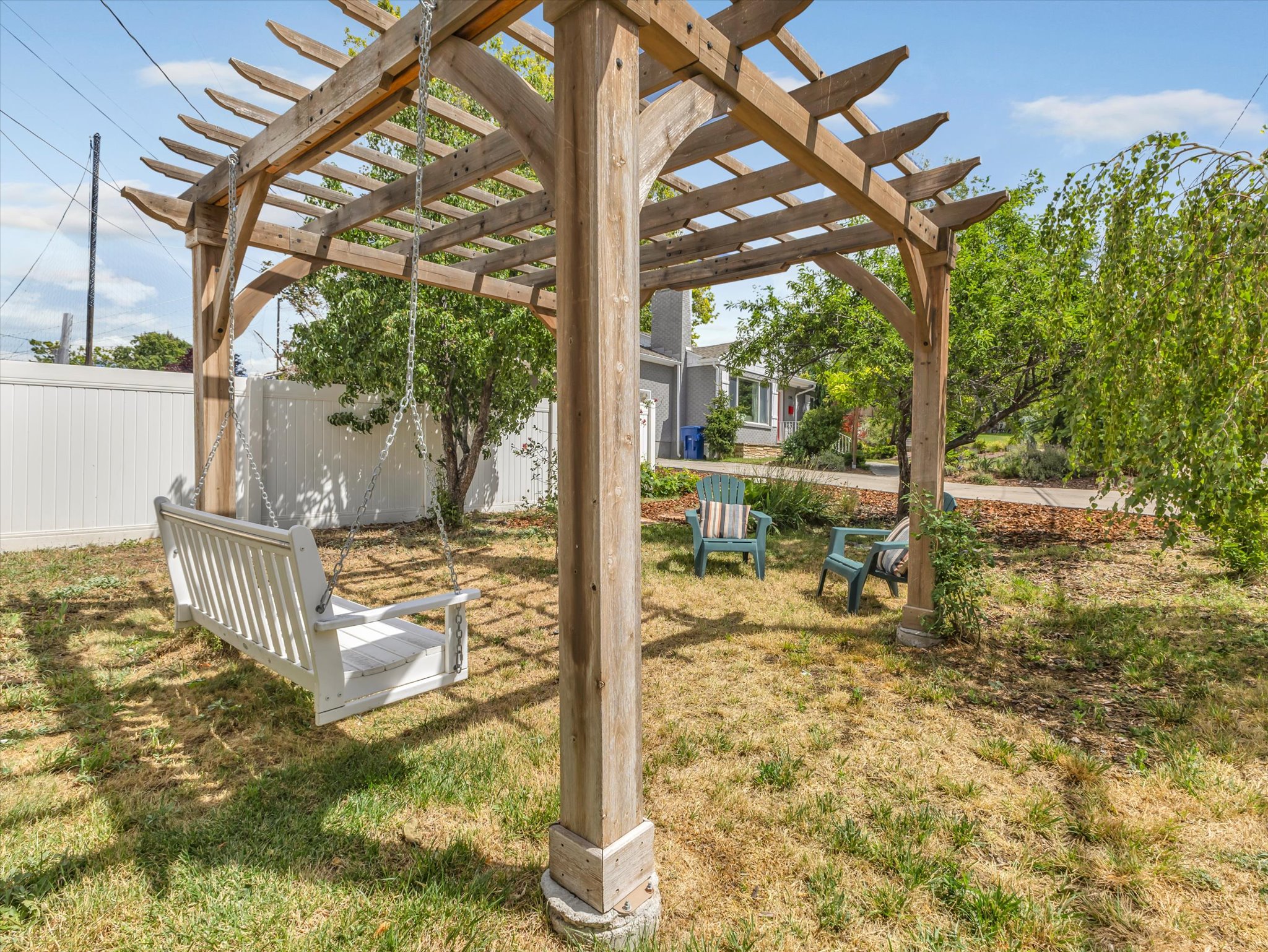 Pergola with a lovely porch swing