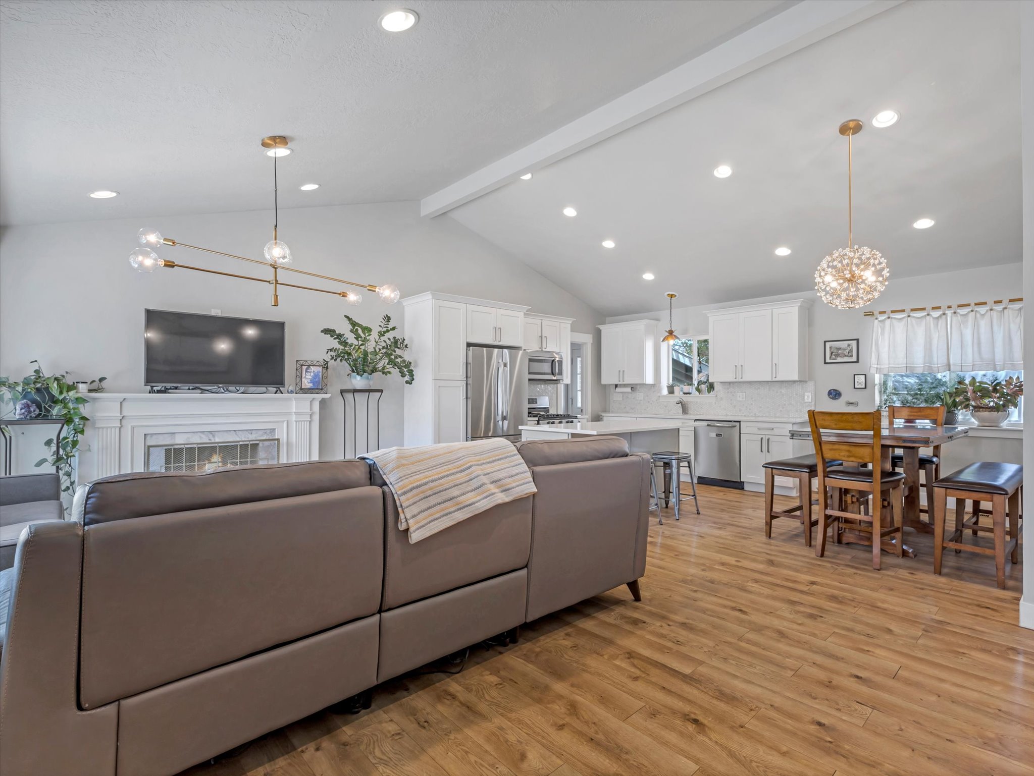 Beautiful Vaulted Ceilings and an Open Floor Plan greet you as you walk in