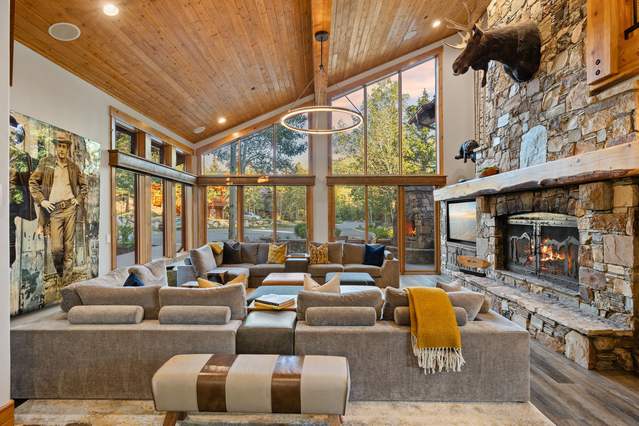 Vaulted wood-paneled ceiling with recessed lighting