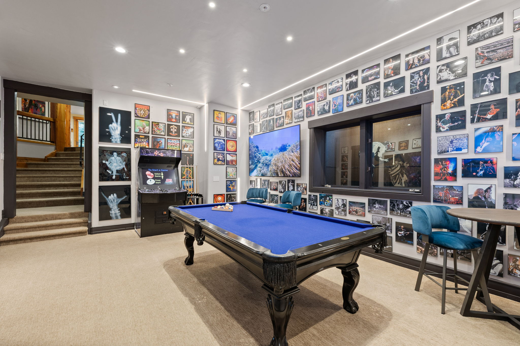 Recreation room featuring a full-size billiard table with blue felt, recessed ceiling lighting, and soft carpet flooring