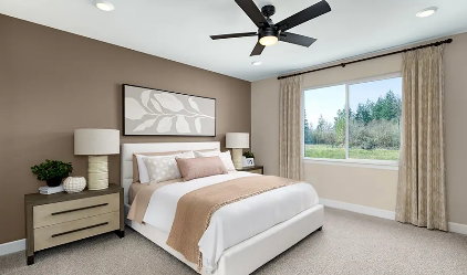 Rendering photo only. Actual finishes may vary. Carpeted bedroom featuring a large window, a ceiling fan with integrated lighting, recessed lighting, and a neutral wall color. Primary Bedroom will have a ceiling fan prewire.