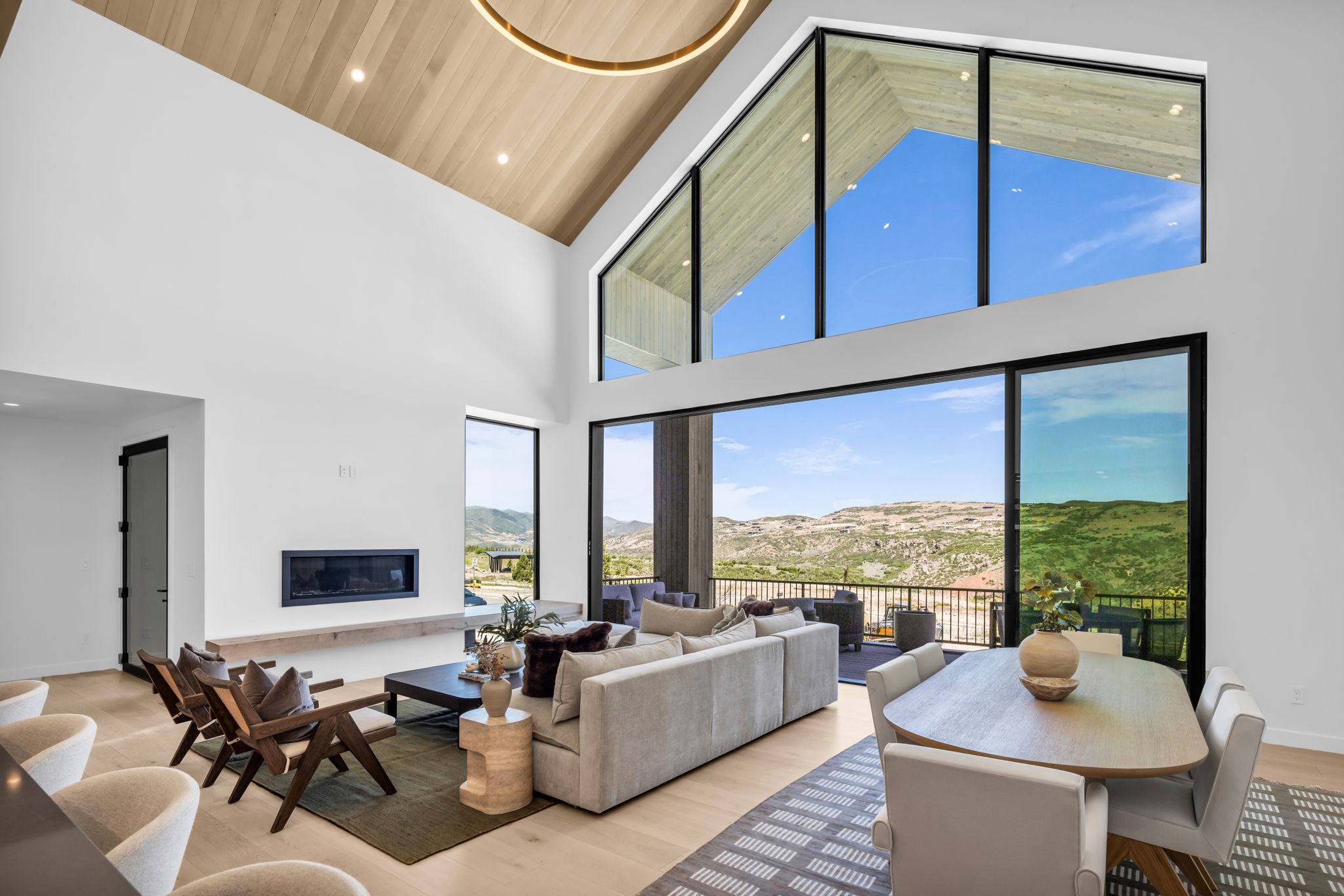 Vaulted ceilings with wood-finish paneling and recessed lighting