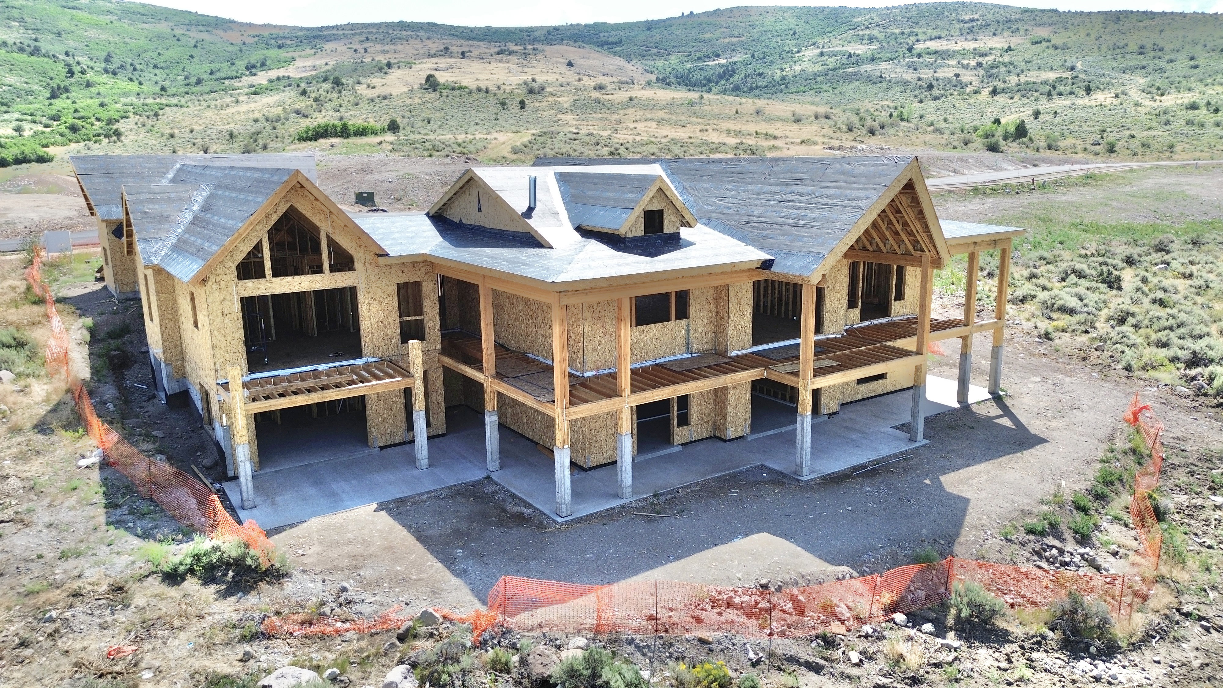 Newly constructed residence featuring a prominent gable roof design