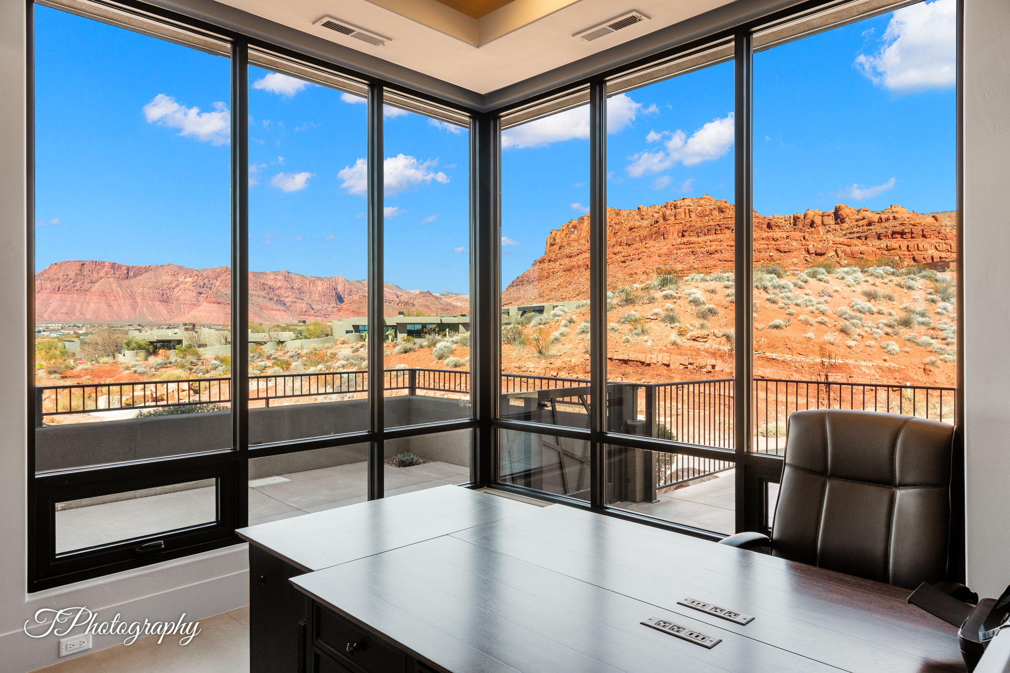 Floor-to-ceiling windows with black framing