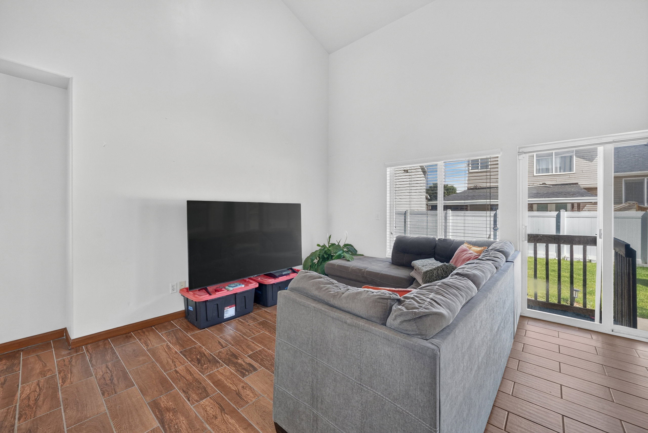 Vaulted ceilings complement the wood-finish flooring