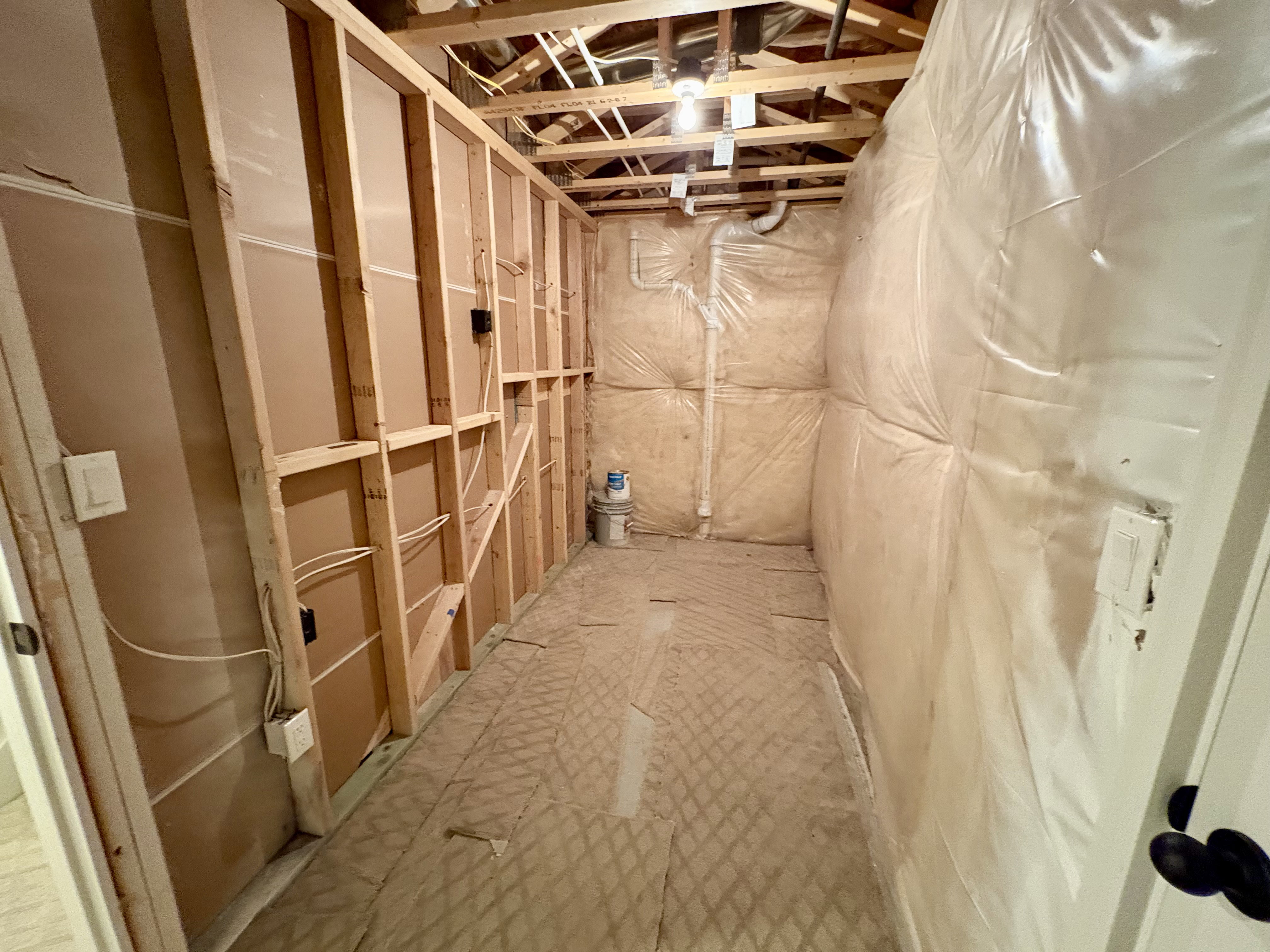 Storage room at the bottom of the stairs