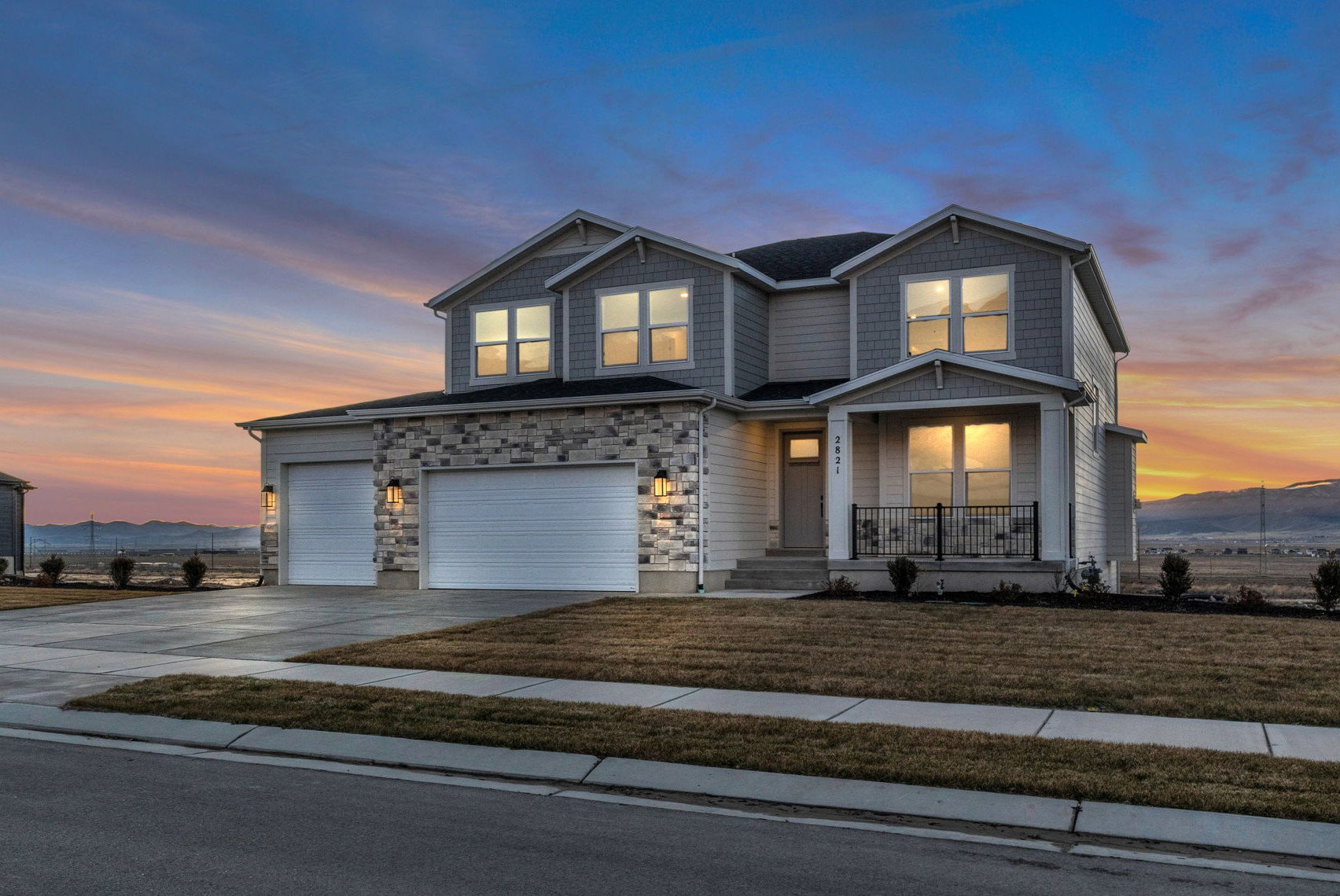 Our two-story "Magnolia" with large covered porch and beautiful mountain views.