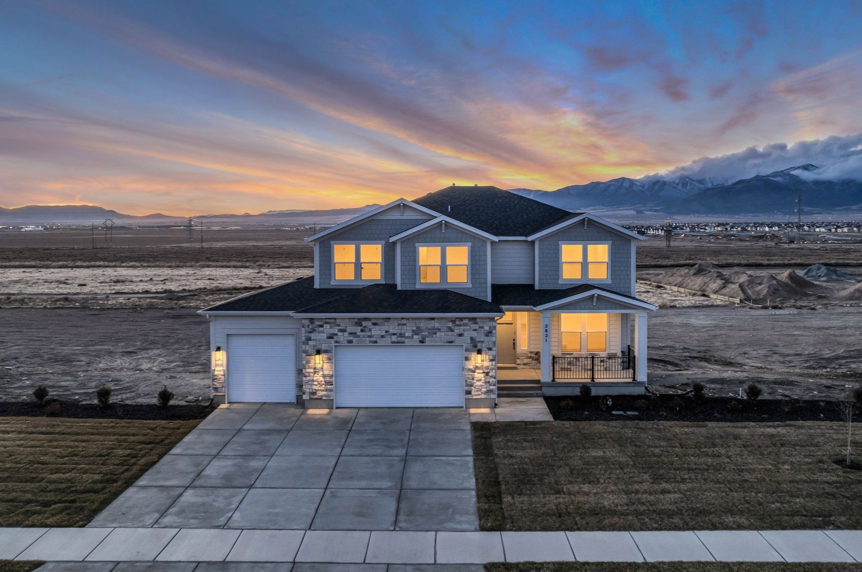 Our two-story "Magnolia" with large covered porch and beautiful mountain views, taken from aerial view.