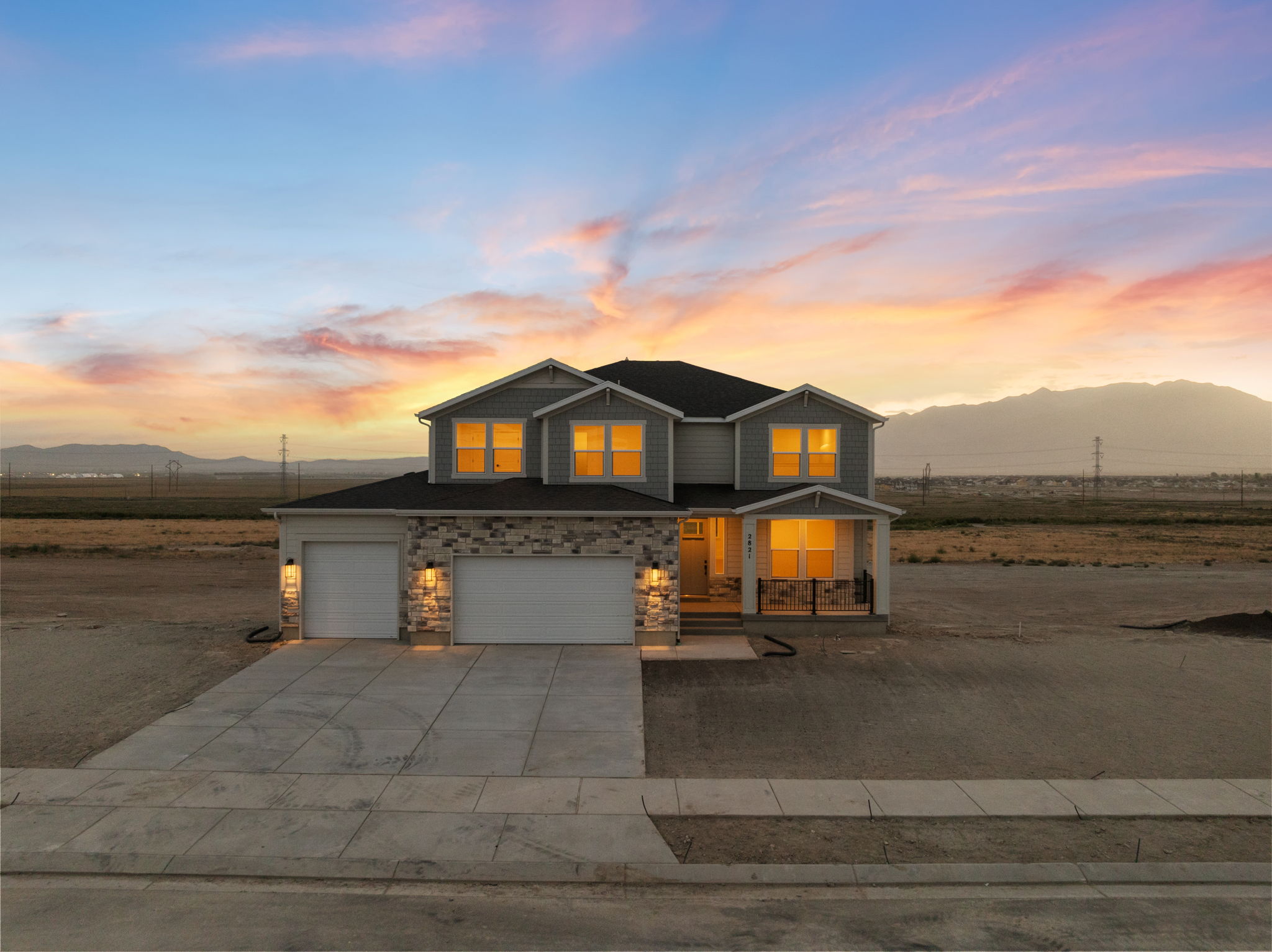Our two-story "Magnolia" with large covered porch and beautiful mountain views to the east and west.