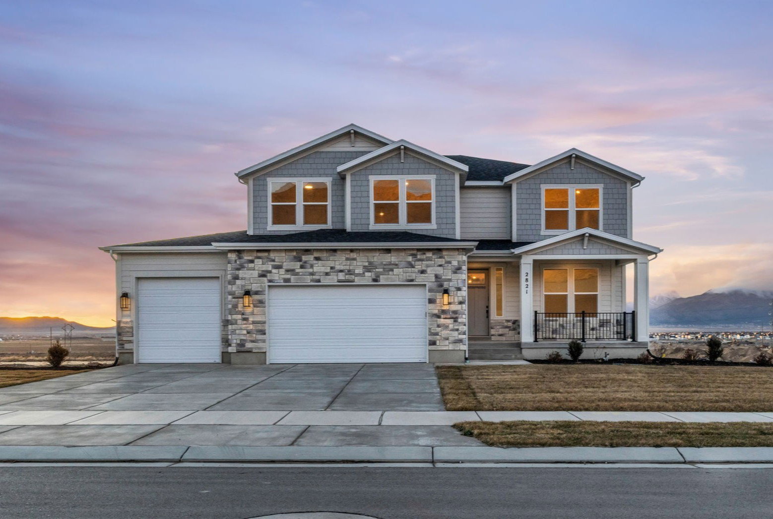 Our two-story "Magnolia" with large covered porch and beautiful mountain views including front yard landscapce.