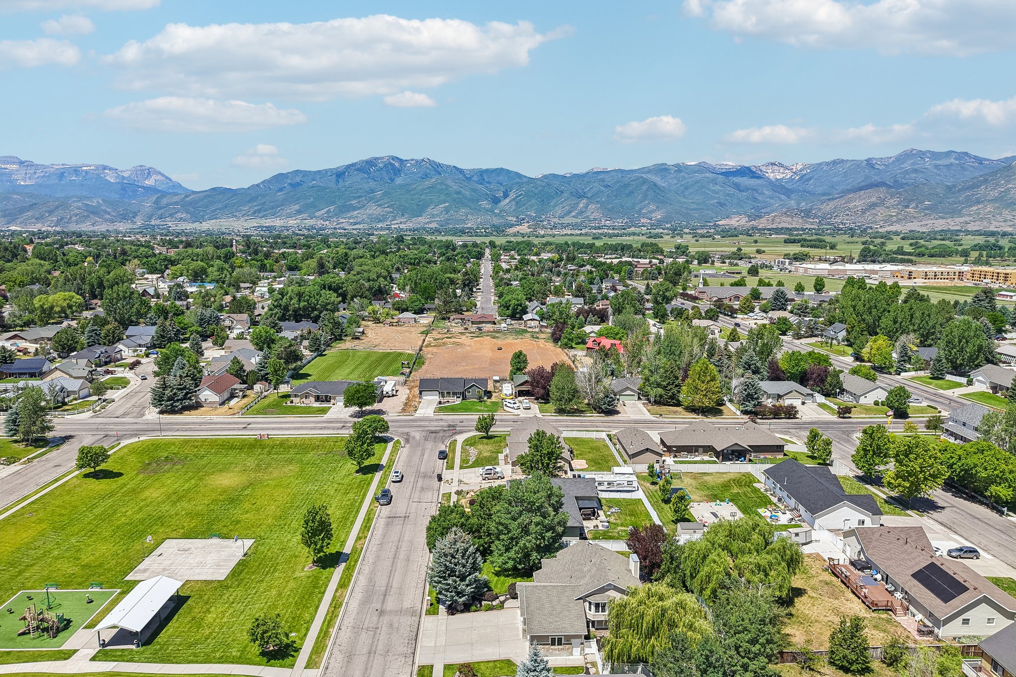 Expansive aerial perspective showcasing a residential area with varied housing styles