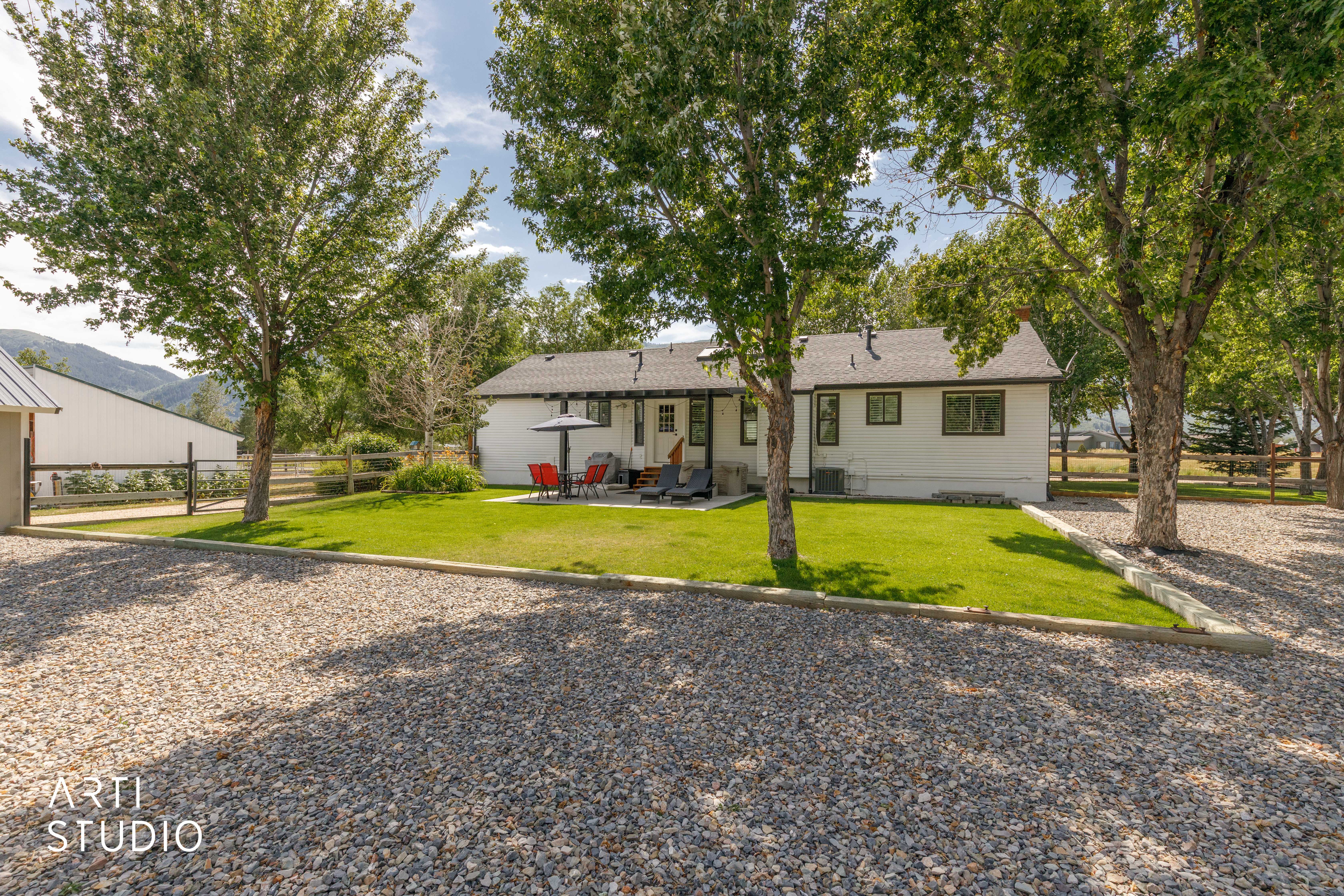 White exterior with dark trim windows