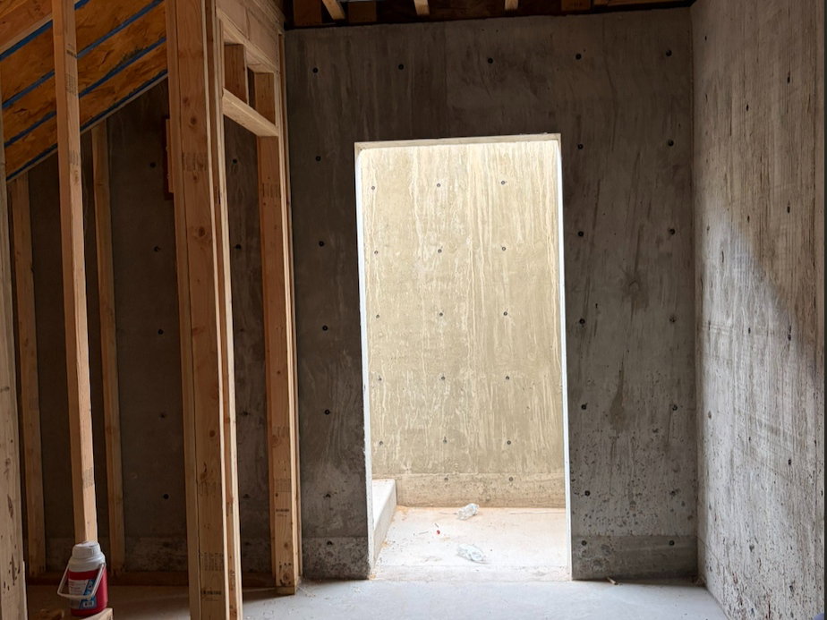 Unfinished basement, exterior entrance.