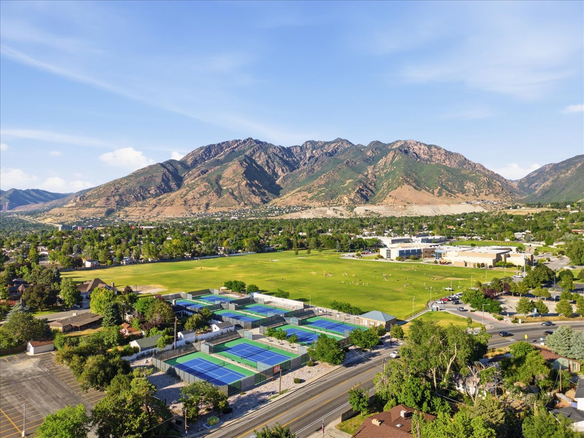 Expansive green spaces and multiple tennis courts