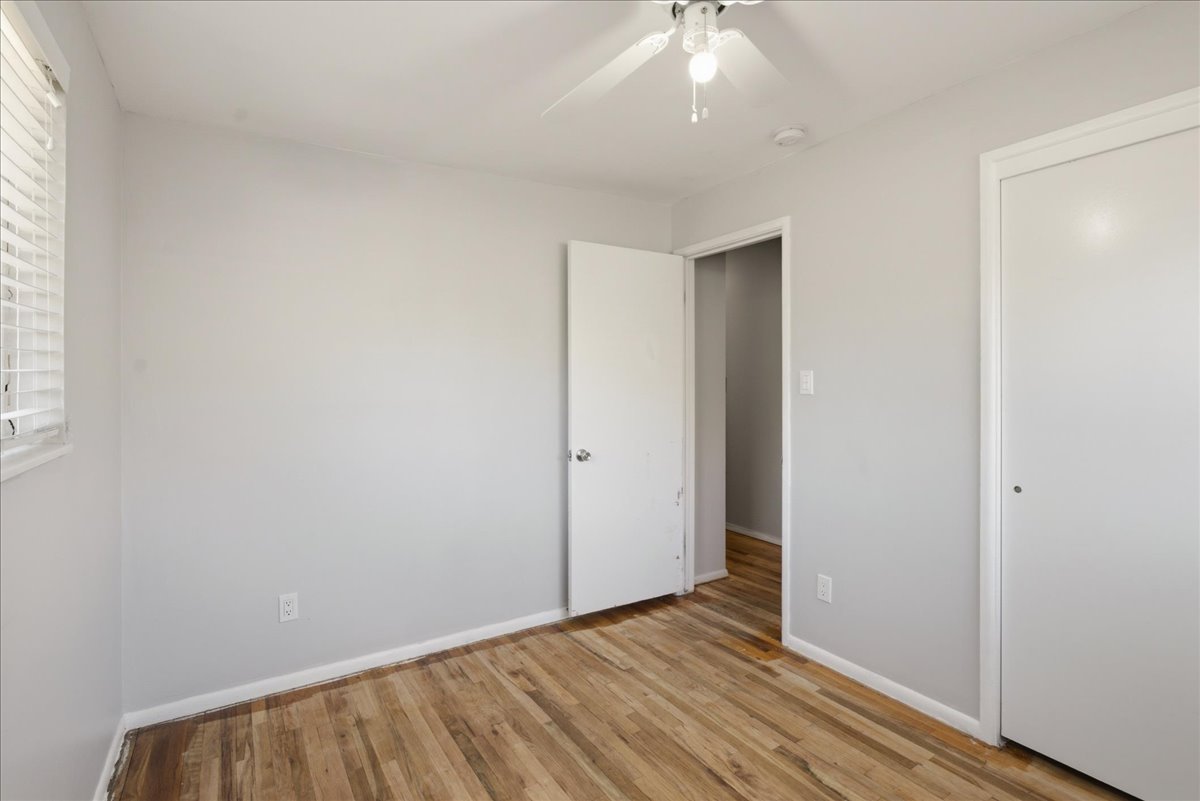 Neutral-toned interior featuring wood-finish flooring