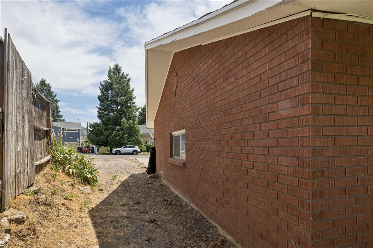 Brick exterior with white soffit and fascia