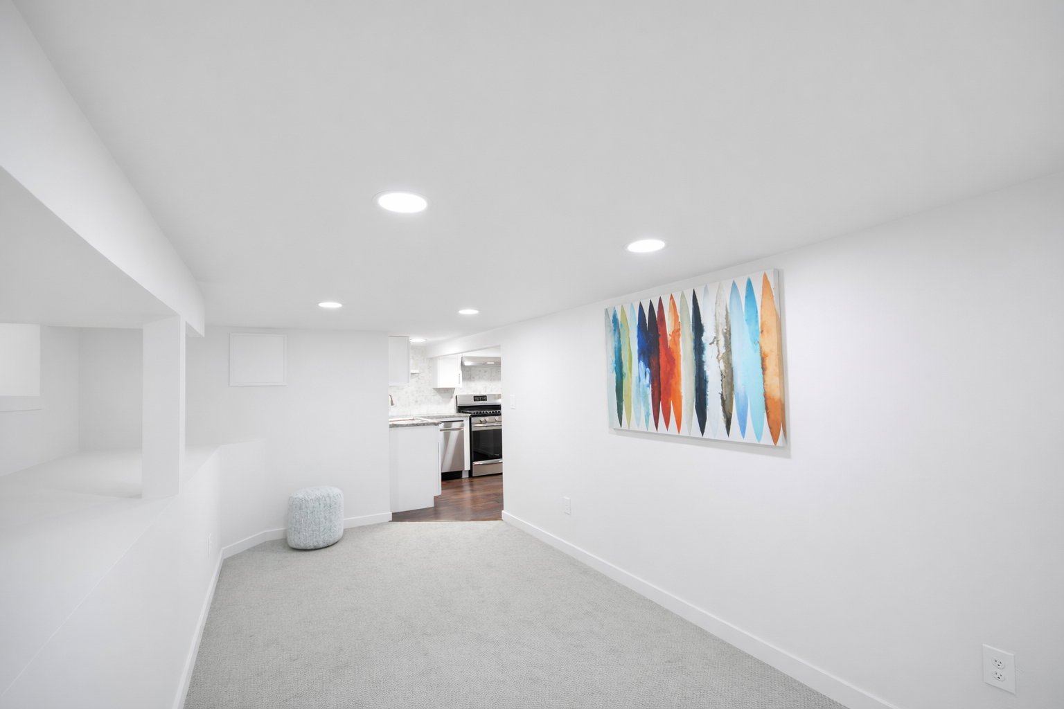 Basement family room. Basement has room 3/office/storage, recreation/family room plus full kitchen with gas stove, stainless appliances and granite countertiops.