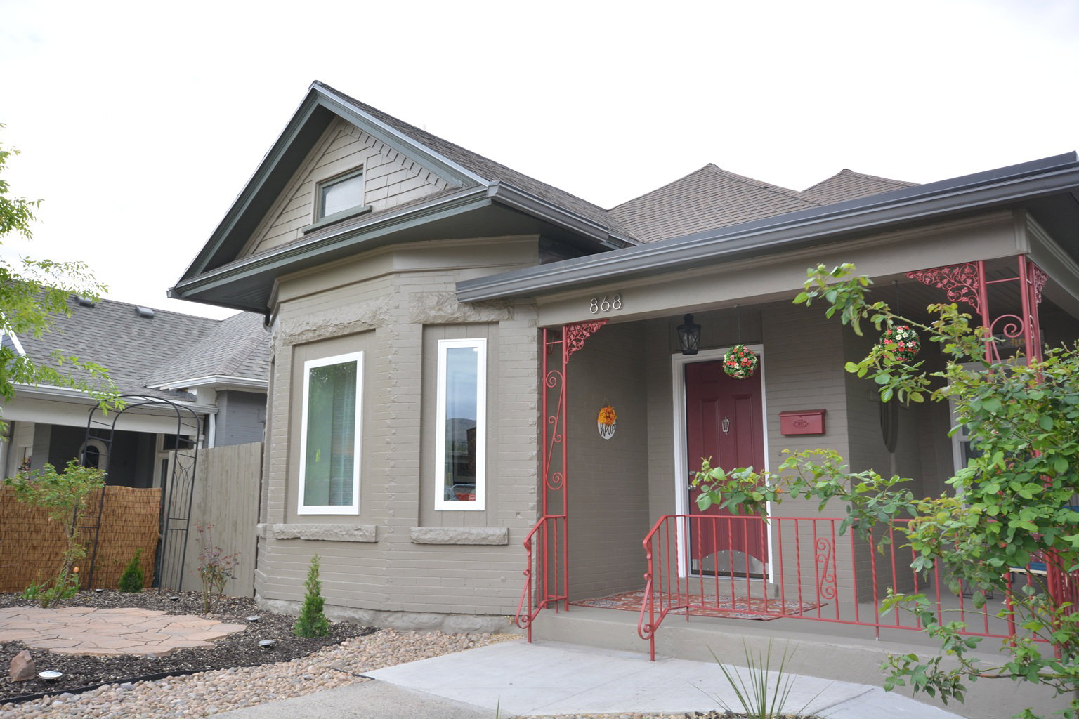 Elegant Victorian style with large covered front porch.