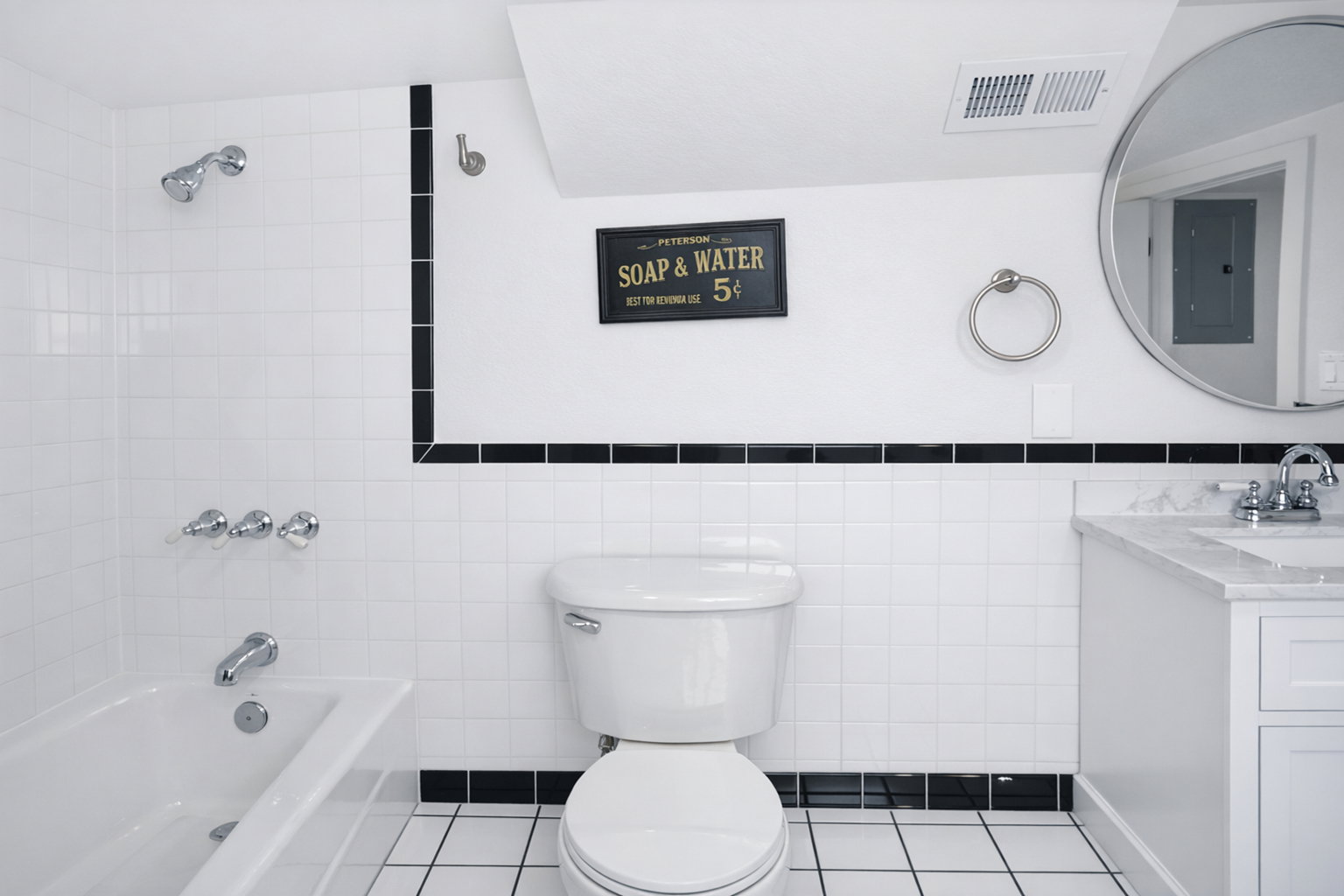 Convenient bathroom on basement level for room 3, recreation/family room and basement kitchen.