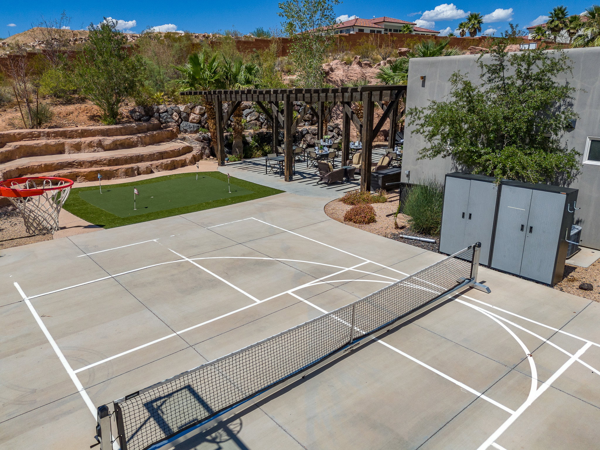 Concrete sport court with painted lines for multiple games