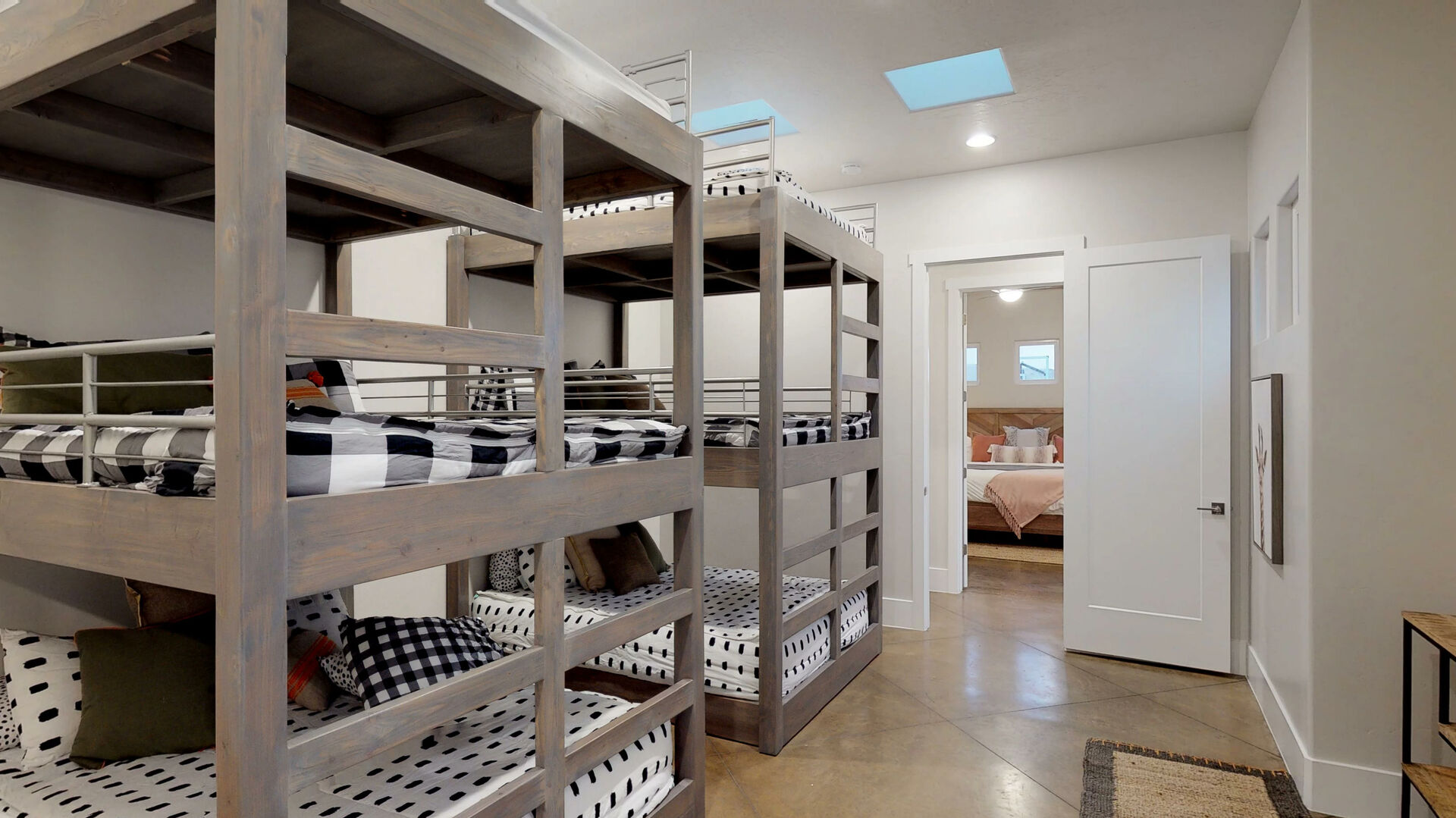 Custom-built bunk beds with wood-finish frames