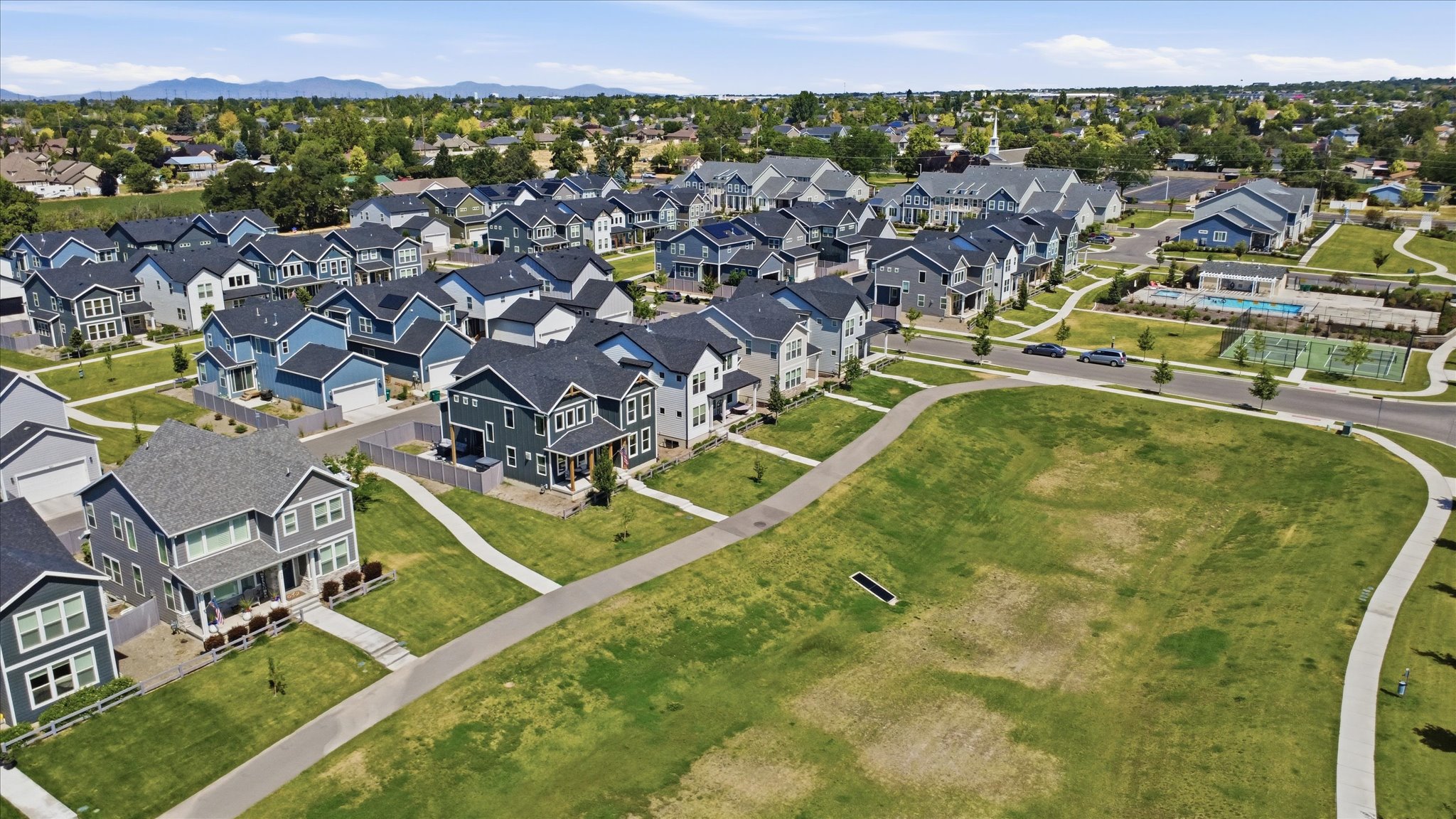 Contemporary residential community featuring uniform architectural styles and color palettes