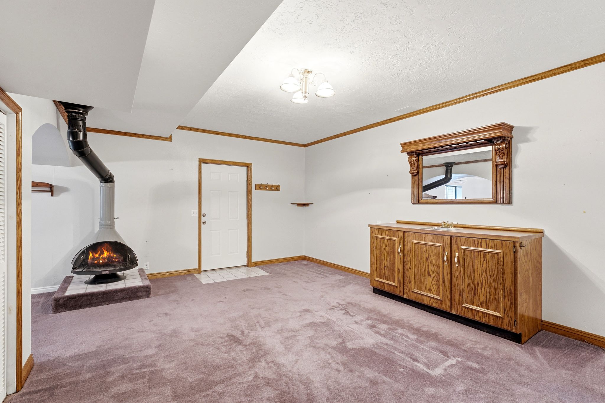 Lower level family room showing door to back yard