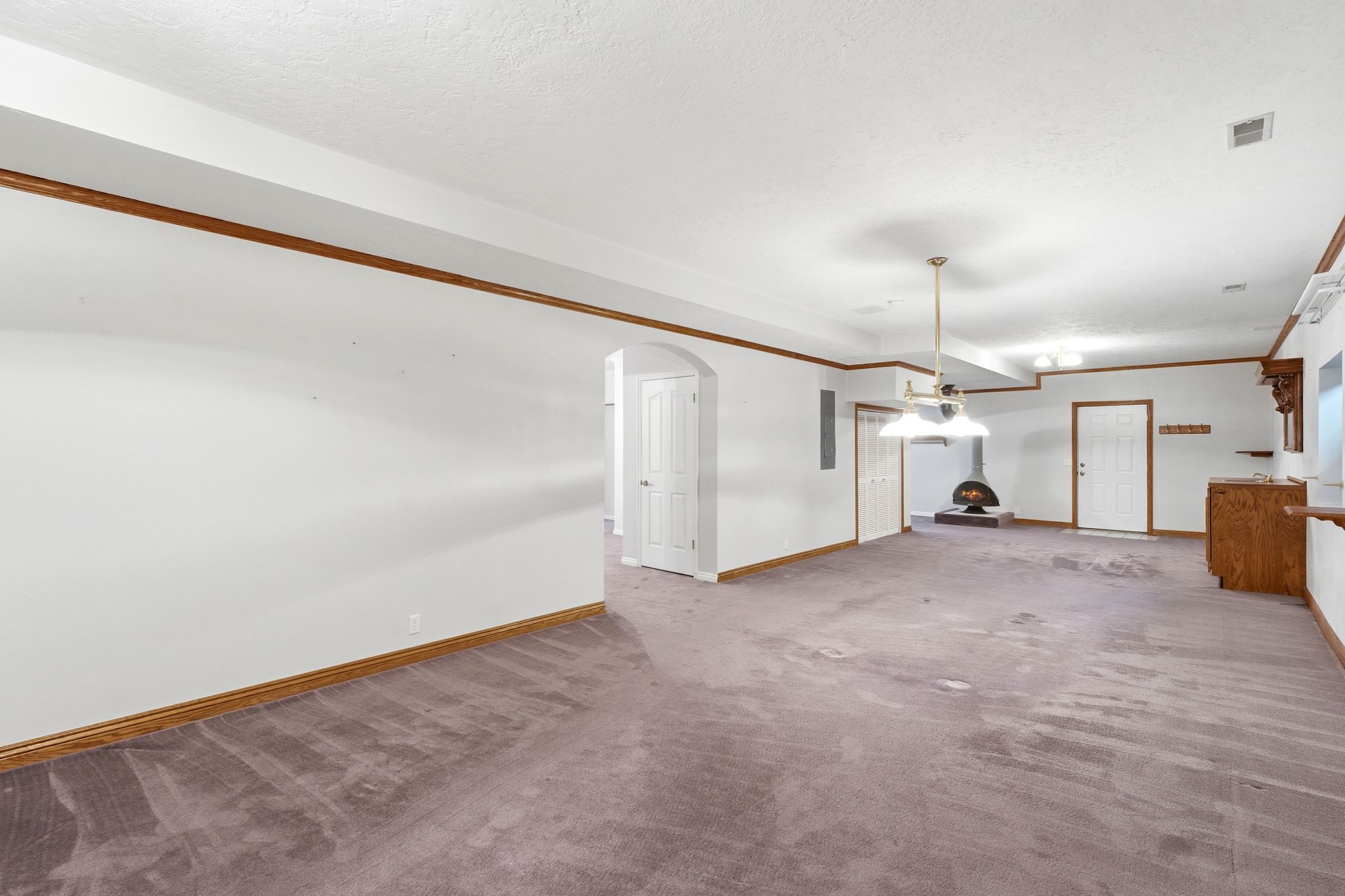 Lower level family room showing walk-out to back yard