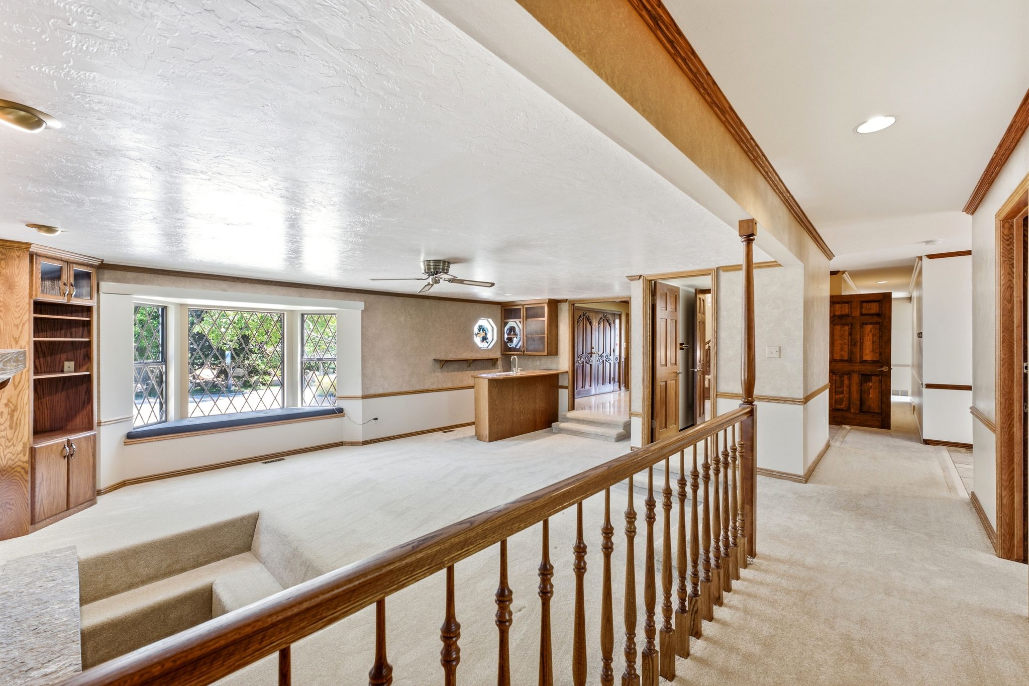 View of main level family room and hallway to the kitchen