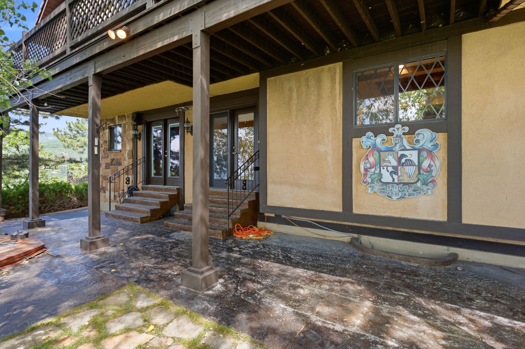 Back patio off of the kitchen, formal dining and office