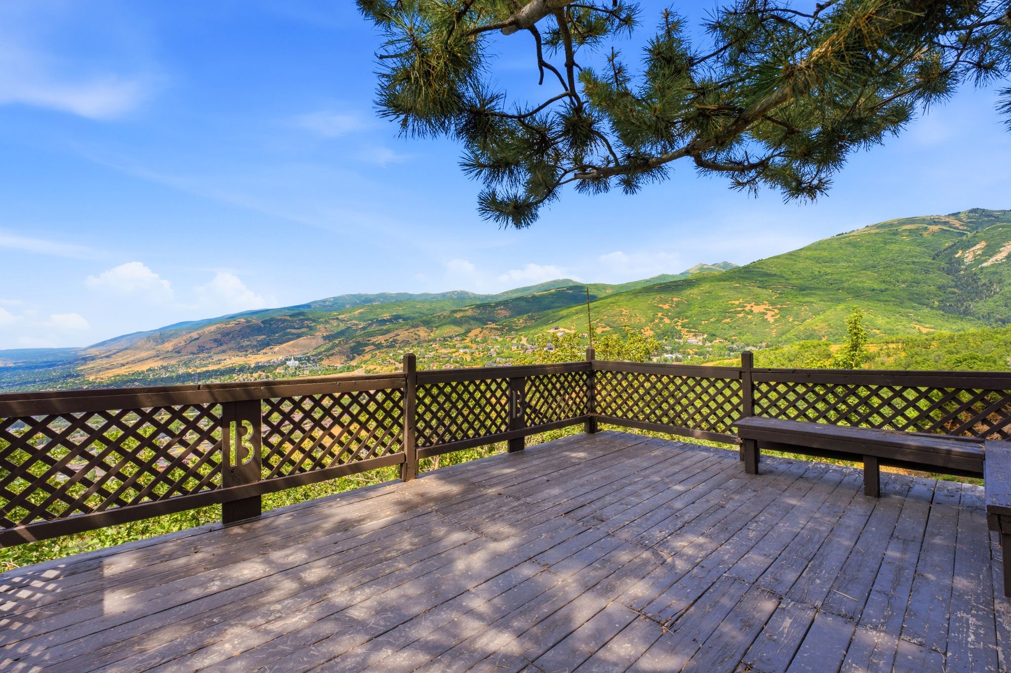 Expansive outdoor deck featuring outstanding valley views