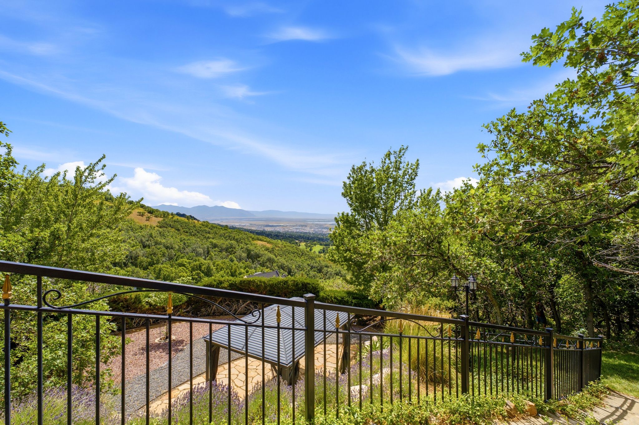 Wrought iron railing looking over large gazebo