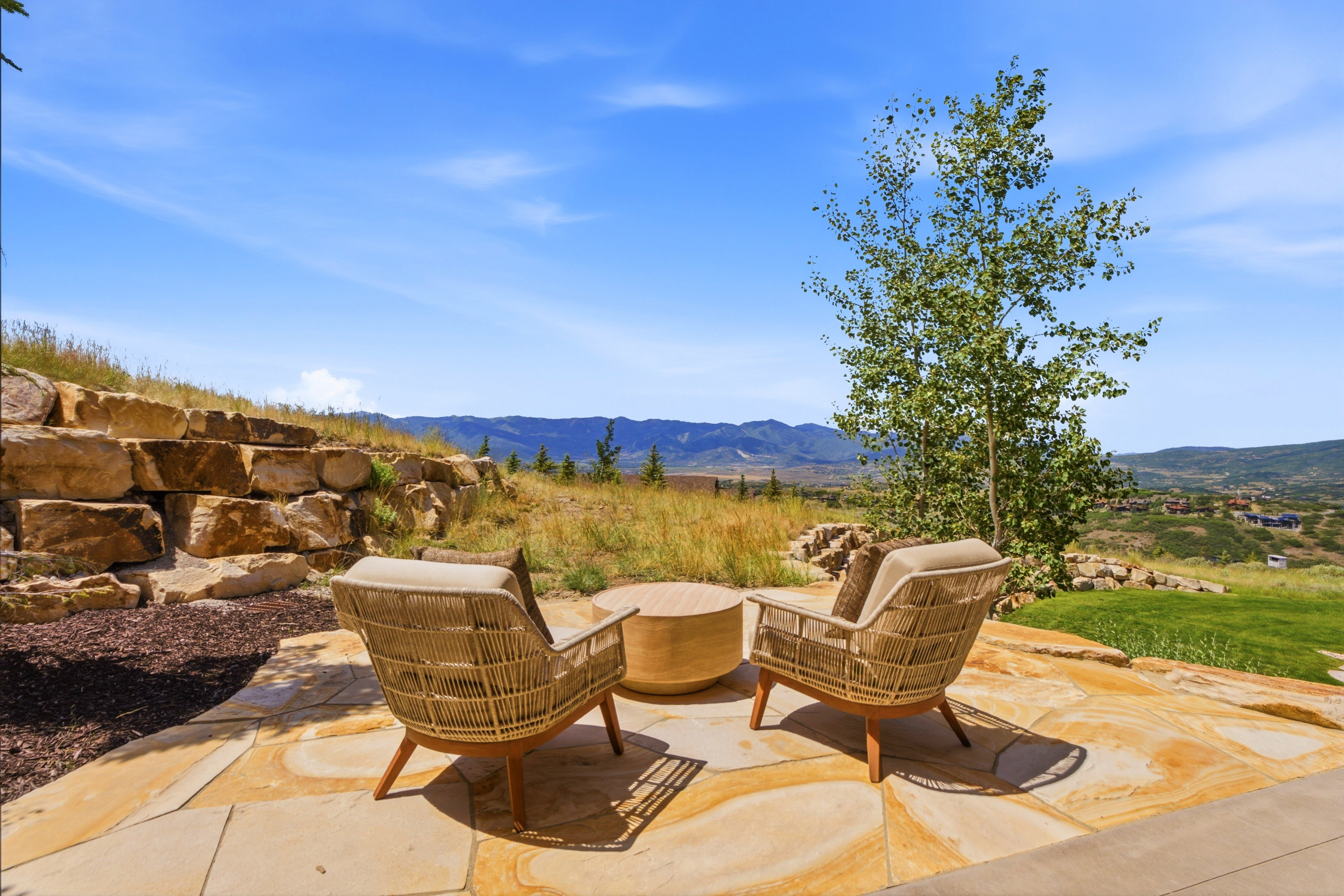 Stone patio with irregular flagstone pavers