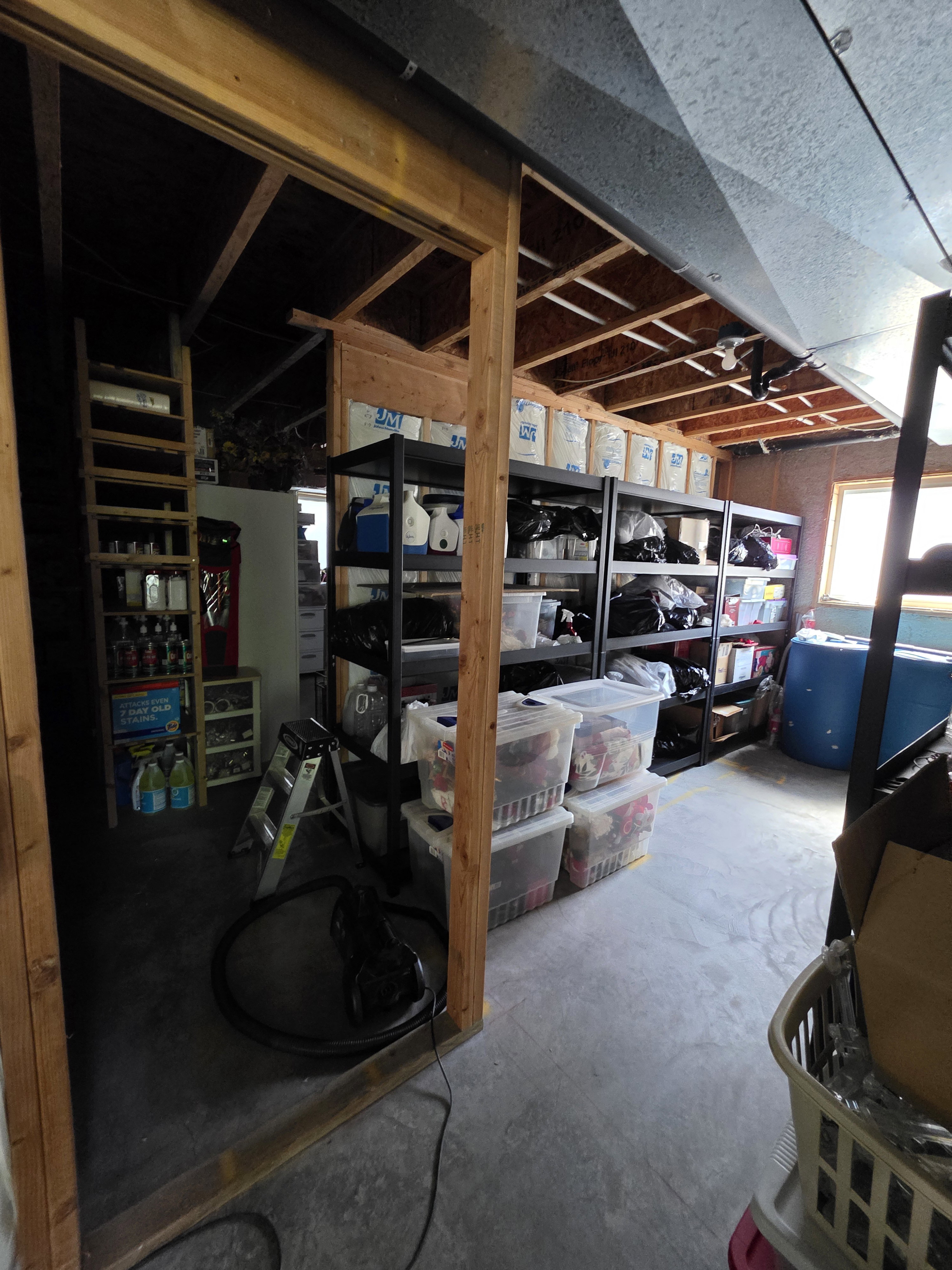 Unfinished utility space with exposed wood framing