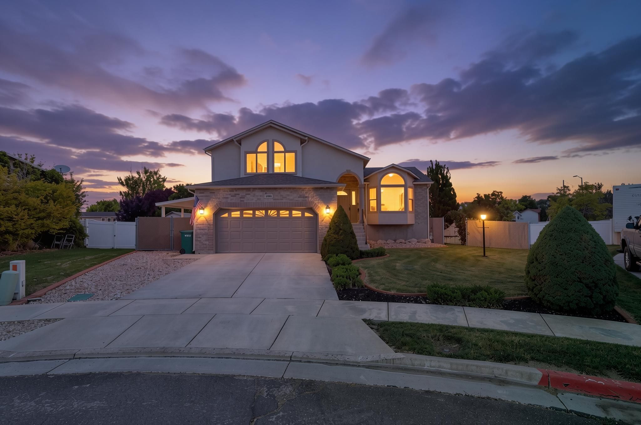 Home with a stone and stucco exterior
