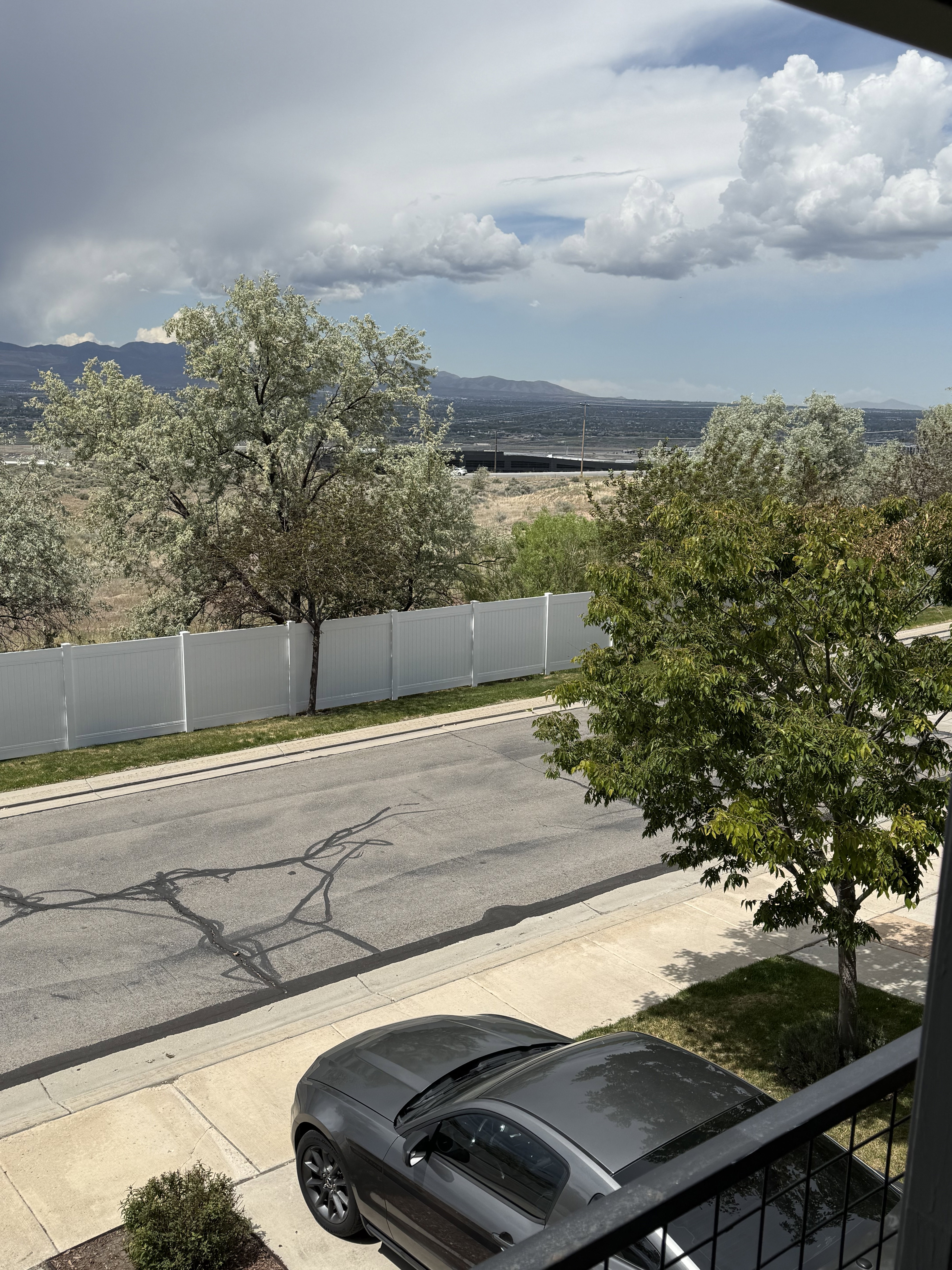 Distant mountain range backdrop with partial valley views