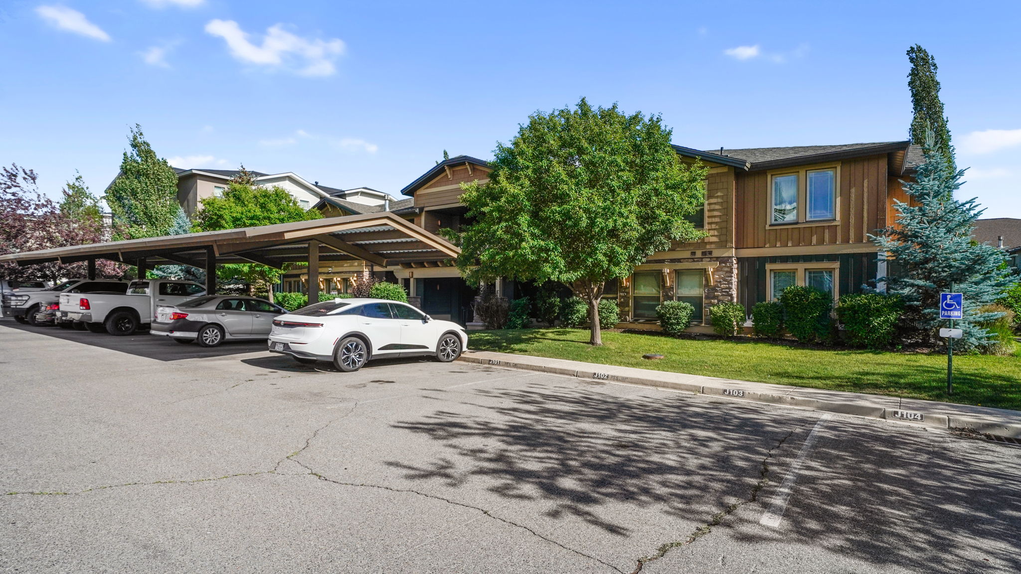 Carport parking structure with brown metal roofing