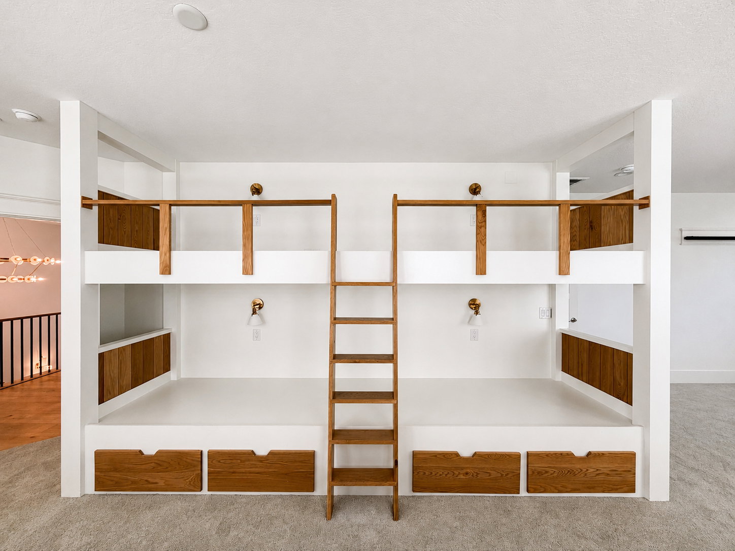 2nd level double wide built-in bunk beds (4) featuring wood-finish ladder and railings