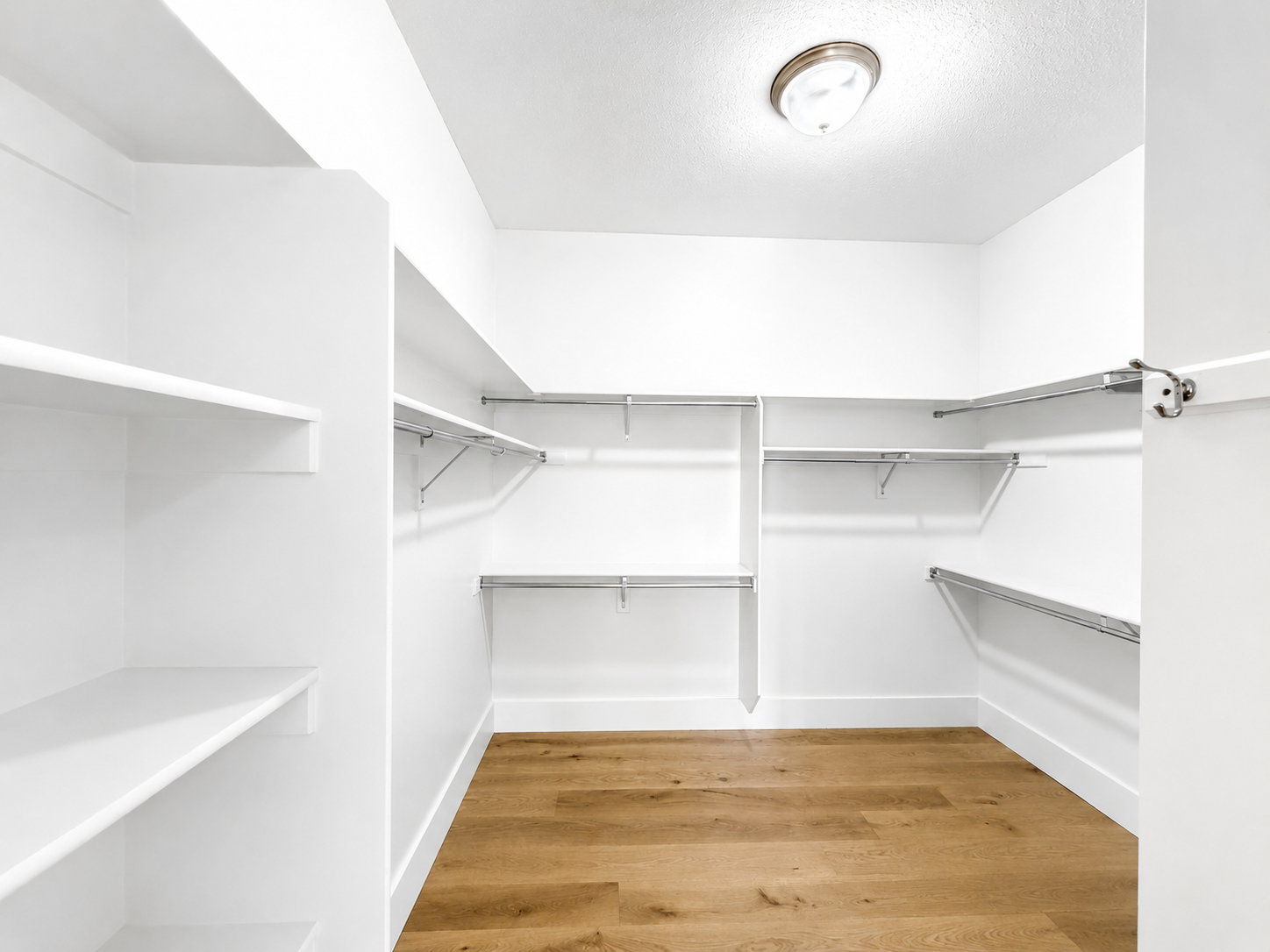 Walk-in closet featuring built-in shelving