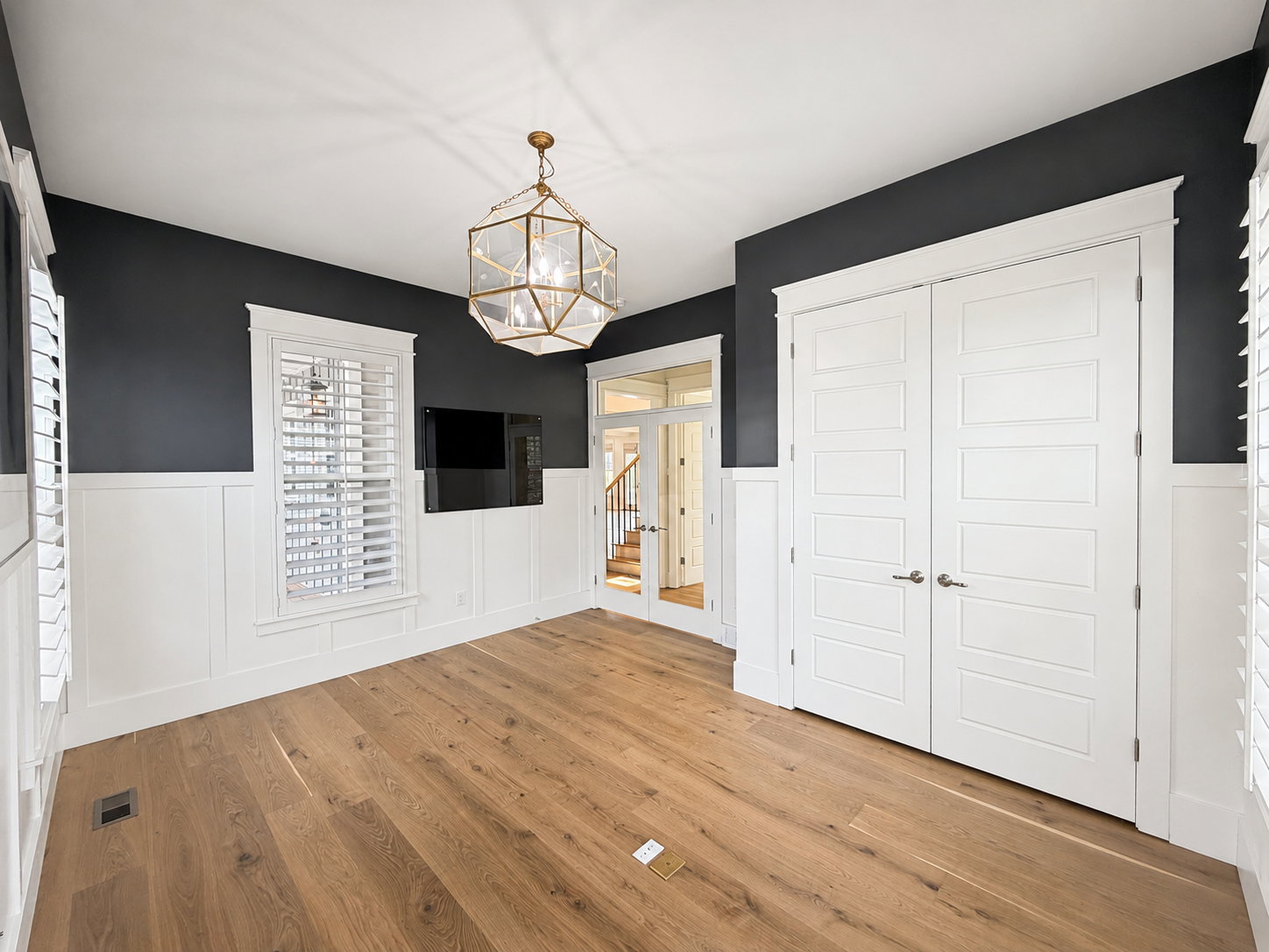 Entry level office/Den/5th bedroom with double door access