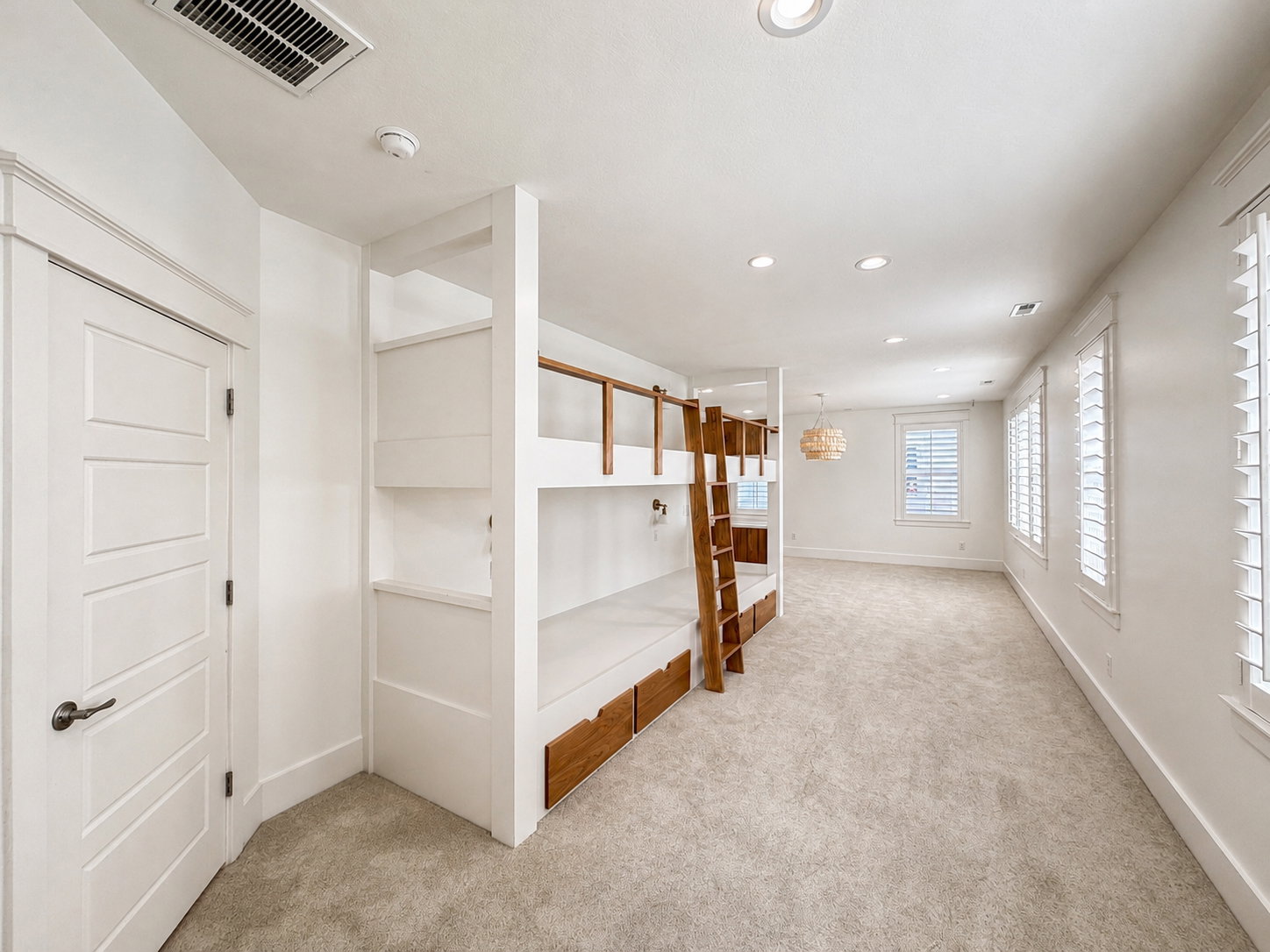 Double bunk beds (4) with storage drawers and individual reading lights