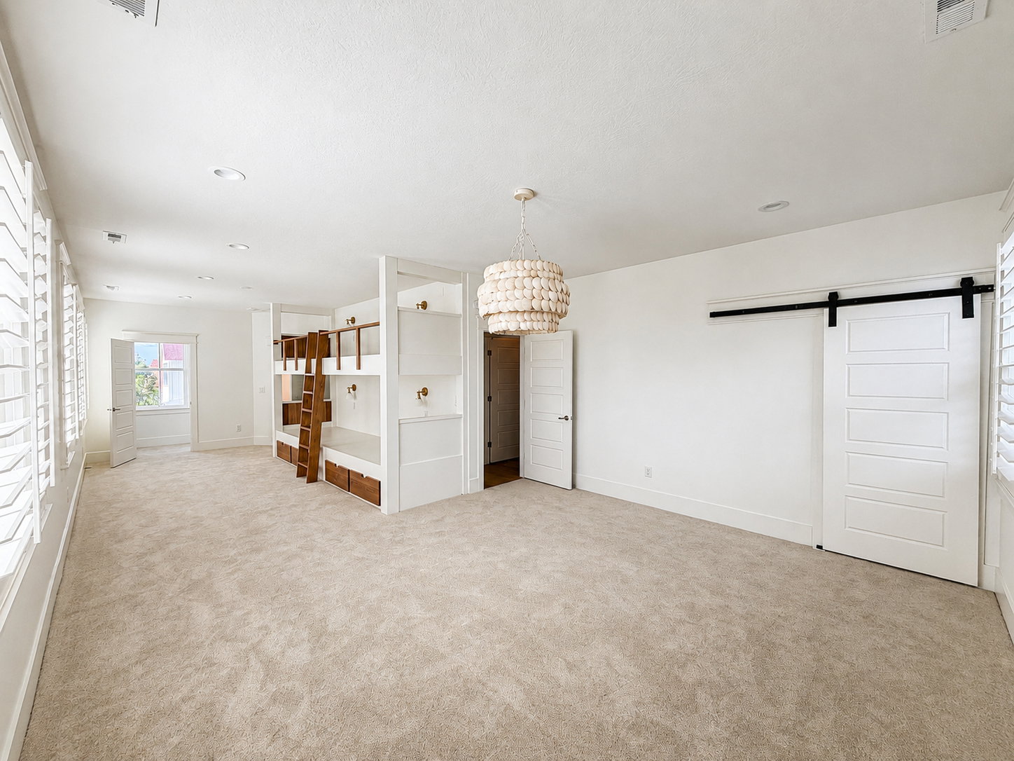 Double sized bunk room with ensuite bath, two walk-in closets and large play/lounge area