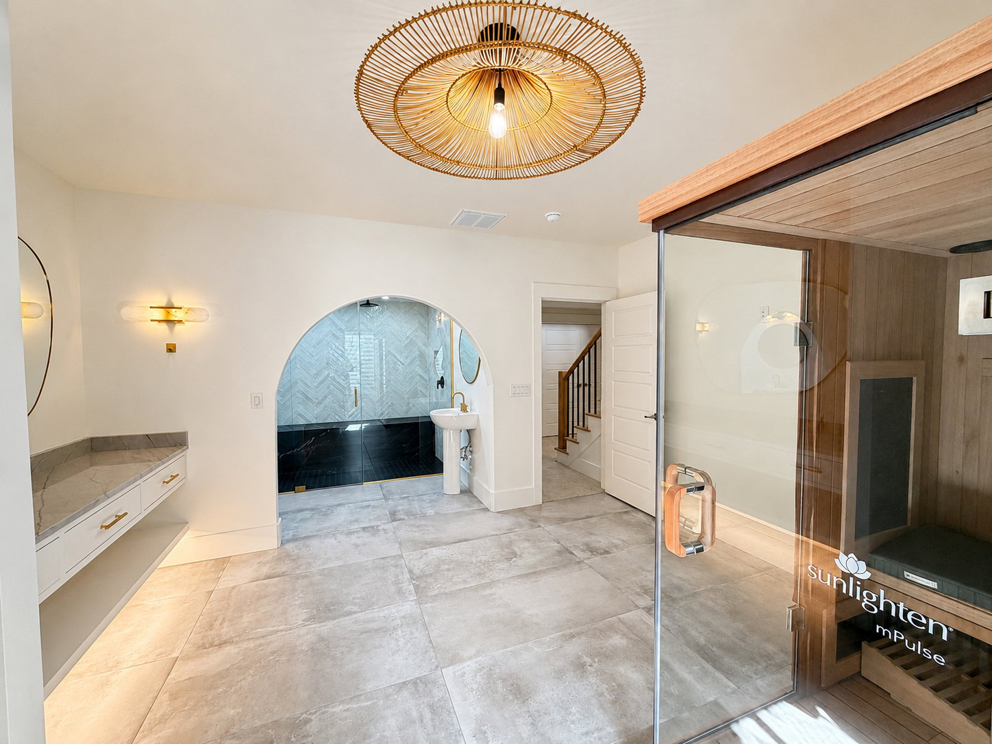 Spa room includes a large Steam shower with multiple heads