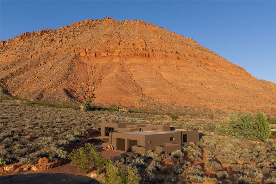 Contemporary desert architecture featuring a flat roofline and stucco exterior