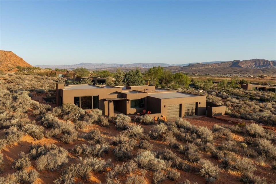 Contemporary desert architecture with a flat roofline and integrated garage